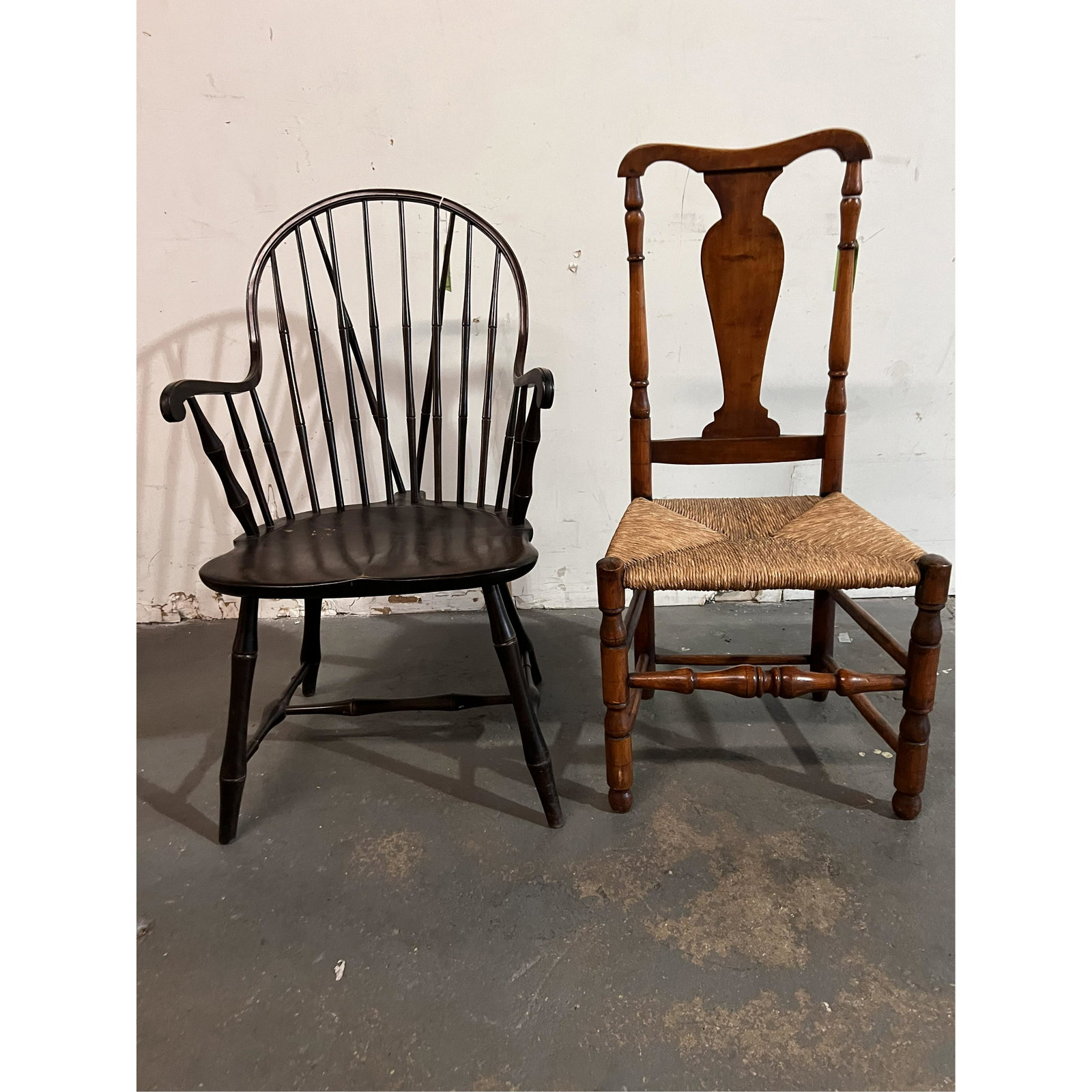 Windsor-Style Chair and Another Chair: A Windsor-style chair and a rush seat chair. [37 1/2" H x 22" W x 21 1/2" D]. In good condition.