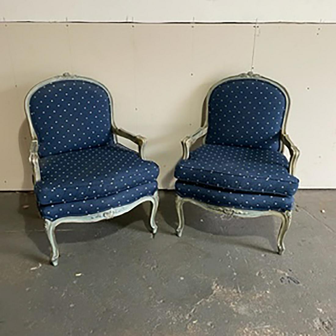 Pair of Louis XV-Style Petit Point Armchairs: Pair of armchairs having carved crest rail and arms with floral carved crest, upholstered in blue.