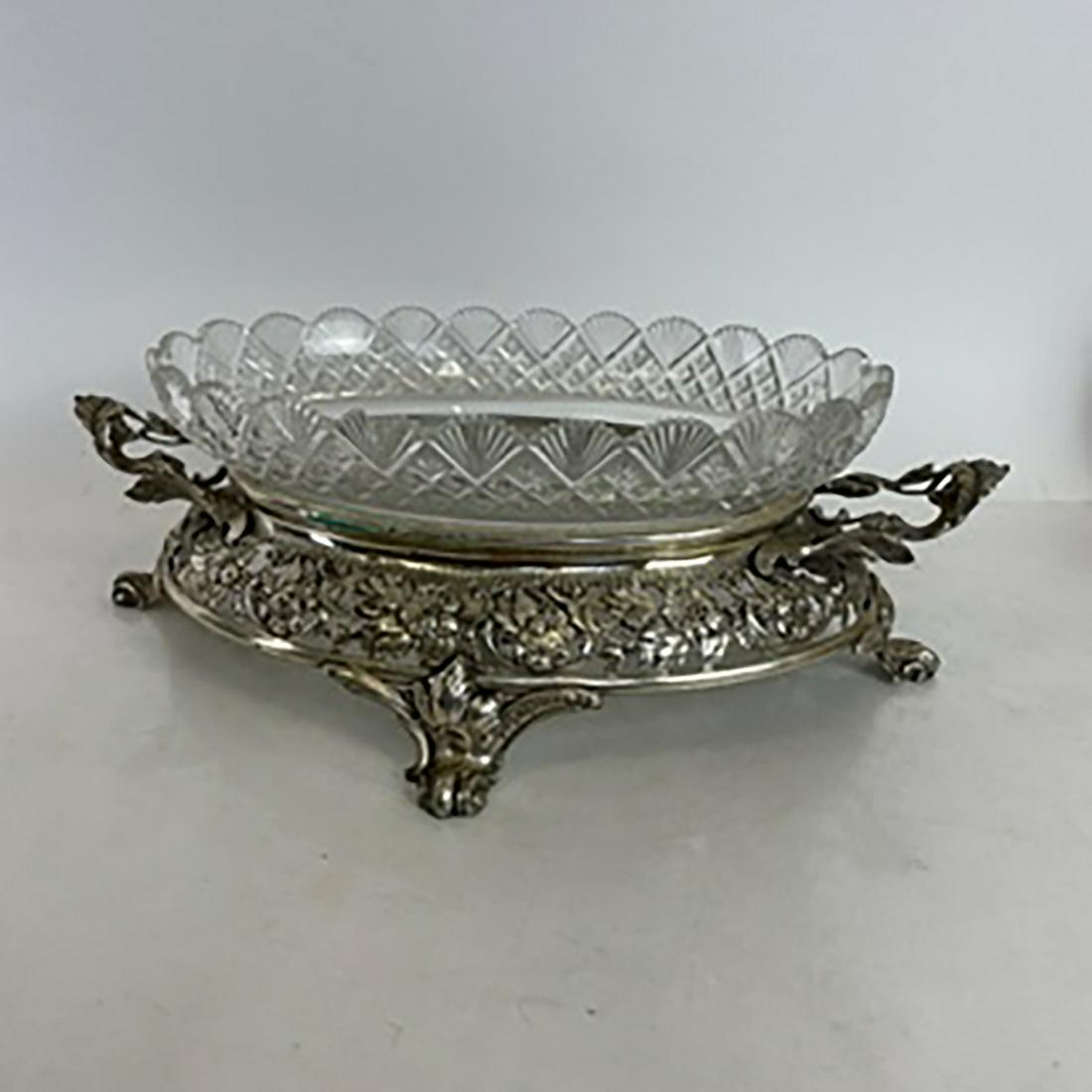 Silver Plate and Crystal Centerpiece: Silver plate and crystal footed centerpiece having all around reticulated foliate design.