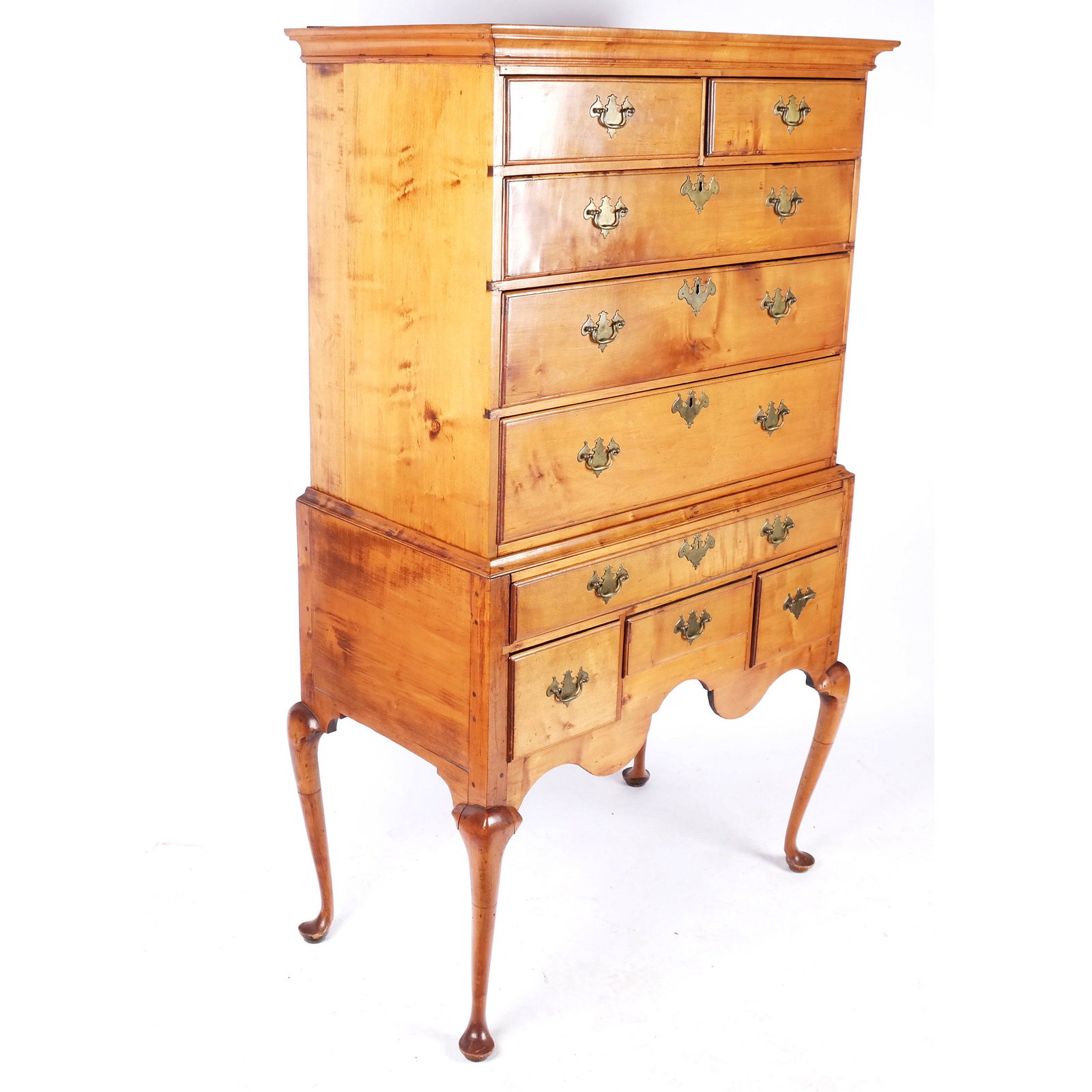 American Flat Top Highboy: American flat top highboy, the upper and lower section with short and long drawers raised on cabriole legs. [67 1/4" H x 39" W x 22 1/2" D]. Areas of patch repairs.