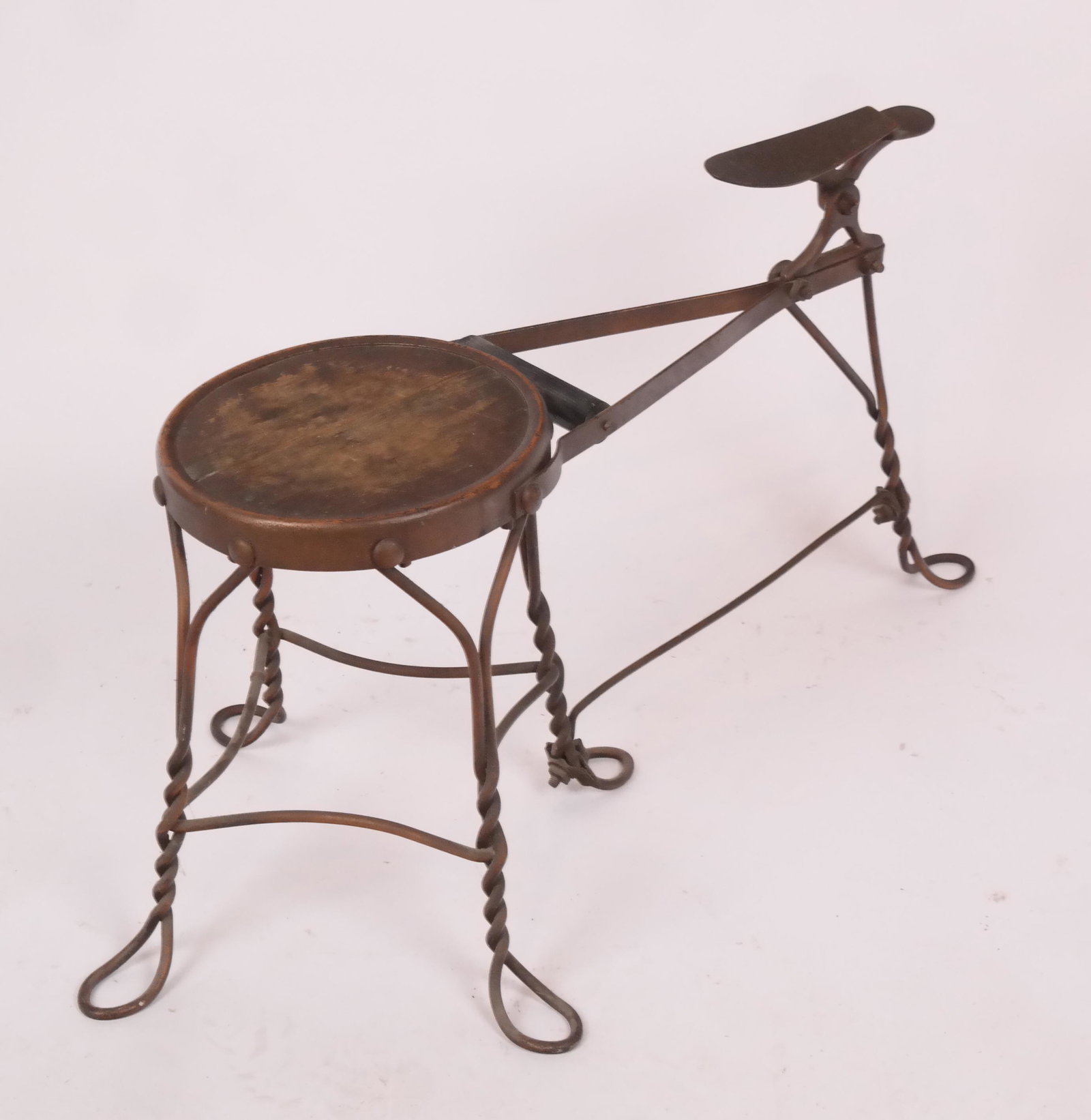 Antique Iron and Wood Shoe Shine Seat: Antique show shine seat, iron base with wood seat. [18 x 33 x 13 inches].