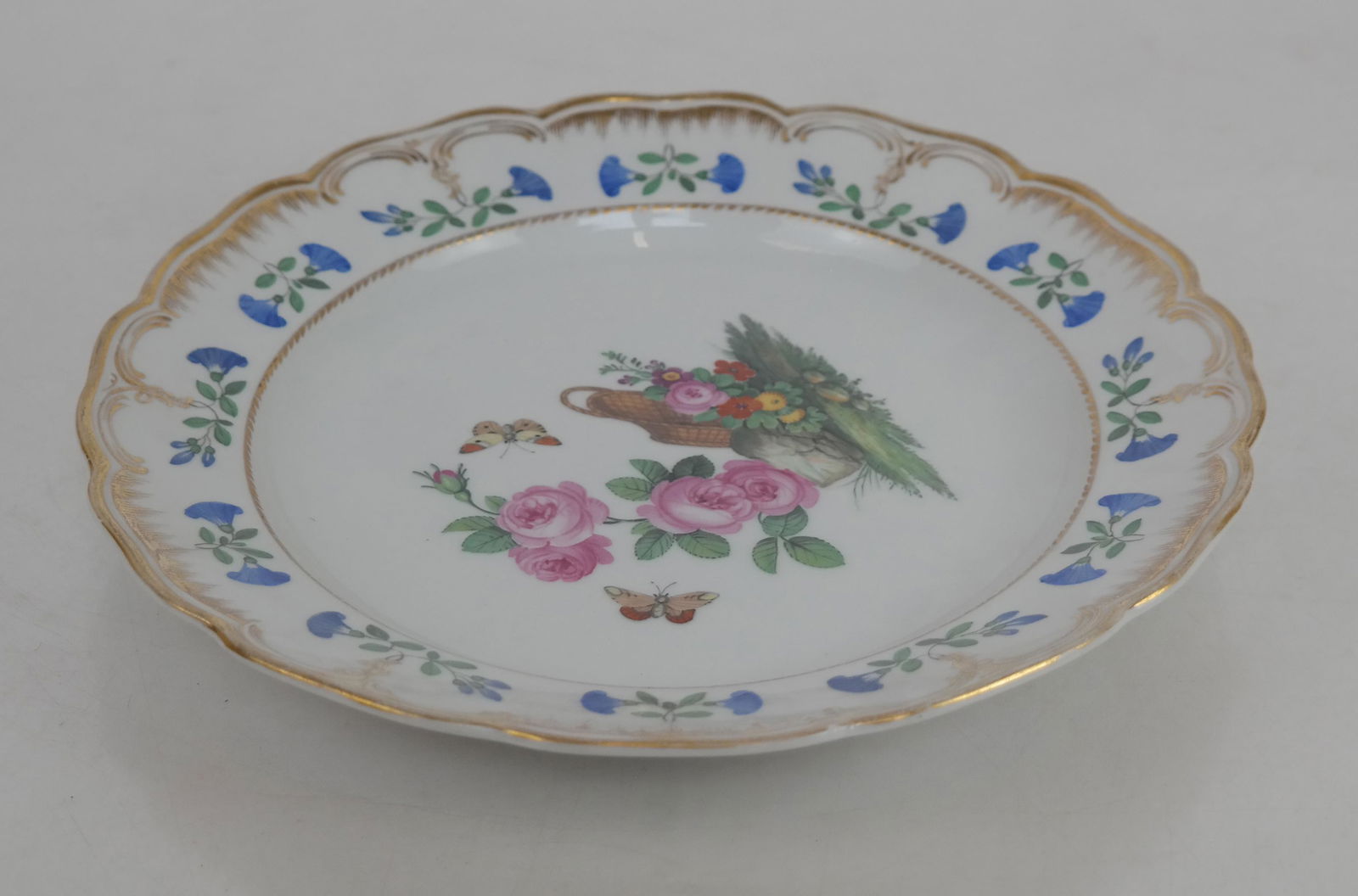 Fine KPM Royal Porcelain Plate, c. 1848: KPM Royal porcelain plate of good weight and hand-painted with gilt and floral decoration, most likely part of a larger service from the Charlottenburg Palace. With orb mark, encircled eagle mark used