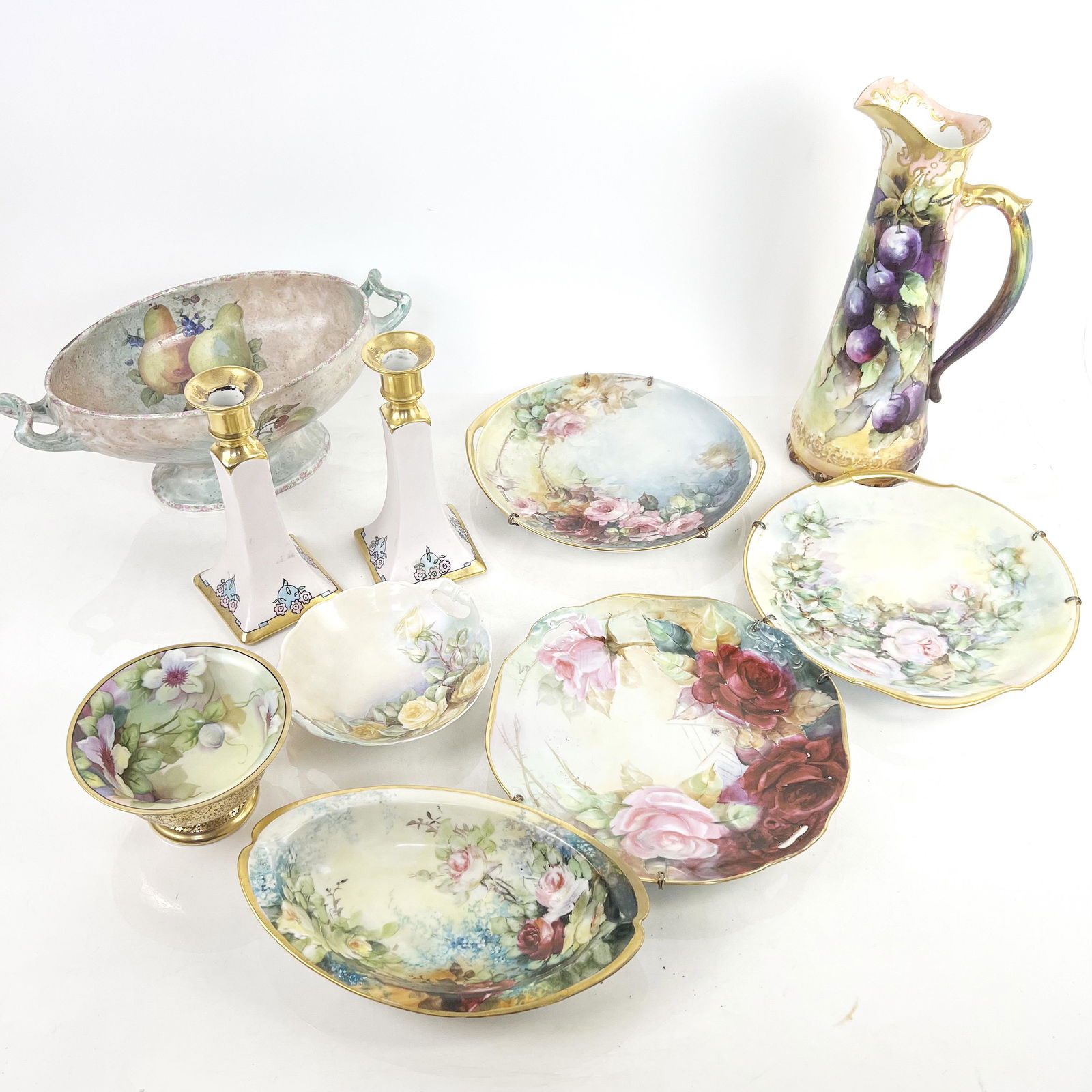 Assembled Group of 7 French Porcelain Items: Assembled group of 7 French gilt-accented porcelain items, with floral or fruit motifs by makers A.K.D. (AKD Klingenberg & Dwenger), Limoges, P.L. (Porcelain Limousine), B & Co. (Bernardaud) and other