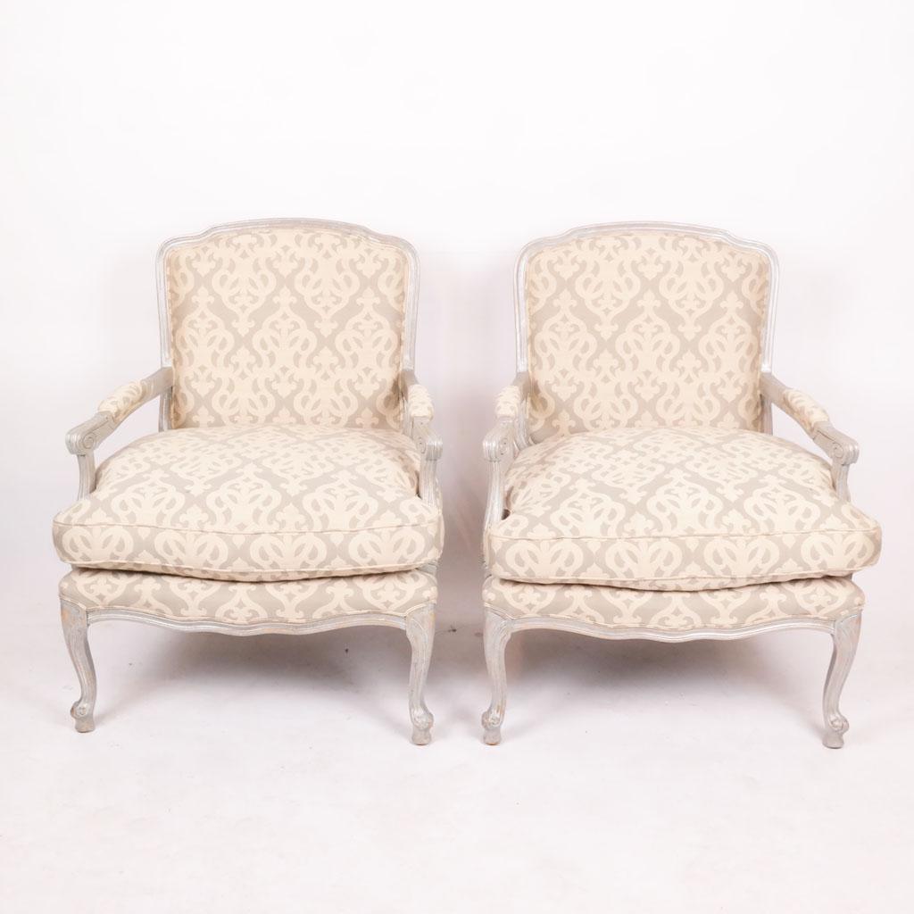 Pair of 20th C. Painted Armchairs: Pair of painted armchairs, with green and gold uphostery. [38" H x 29 1/2" W x 29" D; 18" H to seat].