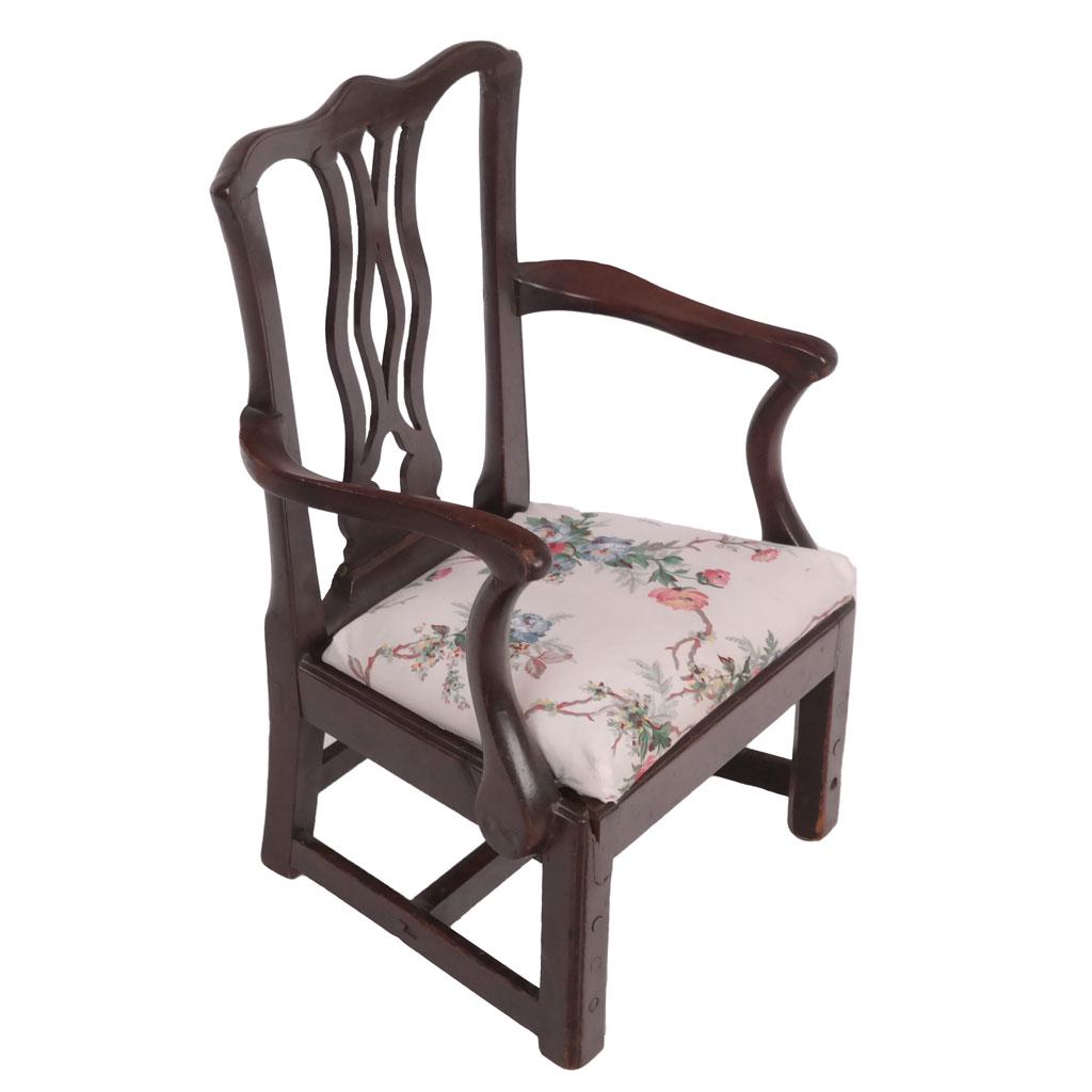 Antique Miniature Child's Armchair: Late George III antique American carved mahogany open-back chair with a slip seat. [25 1/2" H x 17" W x 14 1/2" D; 10" H to seat]. Worn.