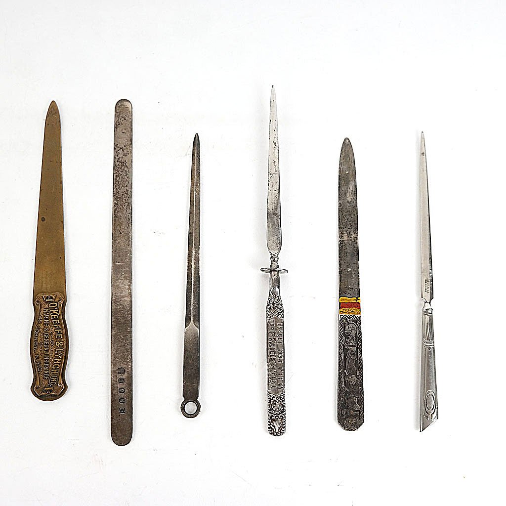 6 Collectible Letter Openers: 6 letter openers, including one by Tiffany & Co. in sterling silver, and others. [Longest: 10" L].