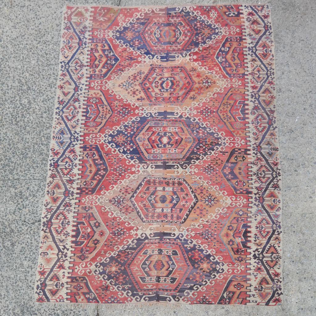 Vintage Turkish Kilim: Vintage Turkish kilim. [110 x 65]. Worn, seam in middle, see photos for condition.