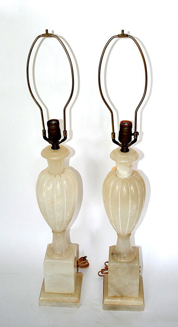 Pair of Alabaster Urn Lamps: Pair of Italian alabaster urn-form table lamps on plinth bases. Good condition. 20" H.