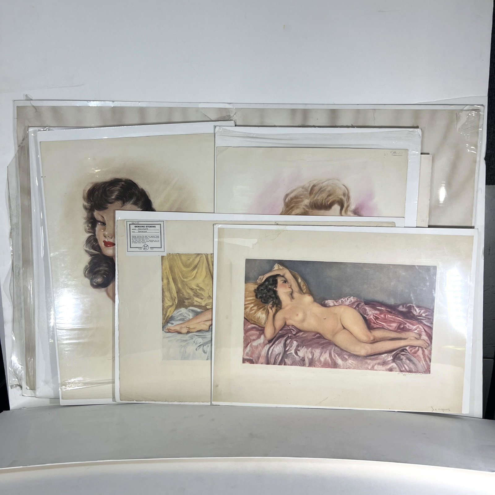 Ten Vintage Pin-Up Nude Lithographs: Group of ten 1950's color lithographs depicting female nudes in various poses. All pencil signed, artists include: J.G. Lempereur, J. Lesage, Guichard, and others. Provenance: Phyllis Lucas Gallery, N