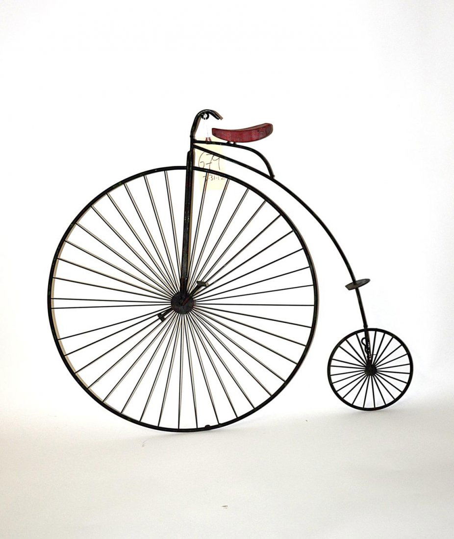 Curtis Jere "Penney Farthing" Bicycle Sculpture: Bicycle sculpture composed of welded steel with wooded seat. Signed "C. Jere 1982" on rear wheel fork. Some scuffs and loose spoke, otherwise in good condition. 33" W x 28" H.