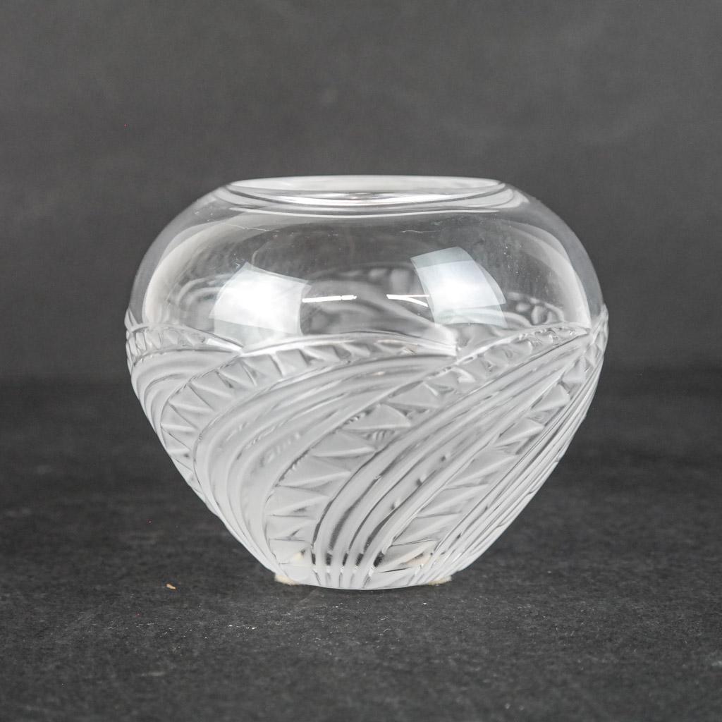 Lalique French Glass "Zagora" Vase: Lalique French glass "Zagora" vase having Art Deco-style arches with geometric details, bearing etched signature to base. [3 1/2" H x 4 1/8" Diam.]. Light abrasions; applied felt to base.