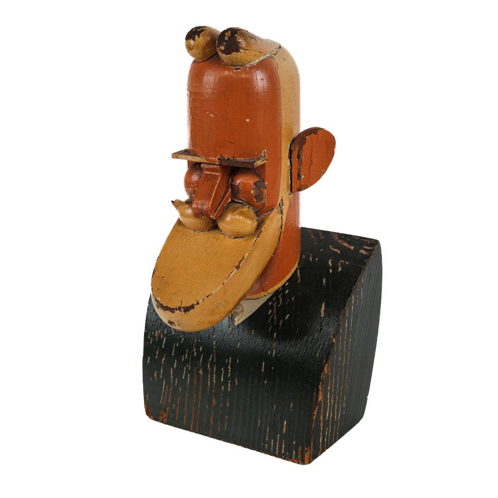 Painted Wood Sculpture of G.B. Shaw: Painted wood sculpture of George Bernard Shaw, unsigned. [9 1/2" H x 5 1/2" W x 5 1/2" D]. Flaked losses to decoration; losses to carving; seam separations.
