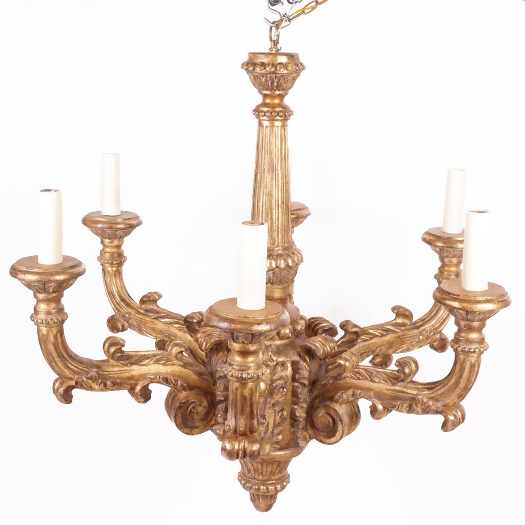 Italian Giltwood 6-Light Chandelier: Italian giltwood chandelier, circa 1940, in the Baroque style. [41" H x 42" Diam.]. Some chips to edges of gilding.