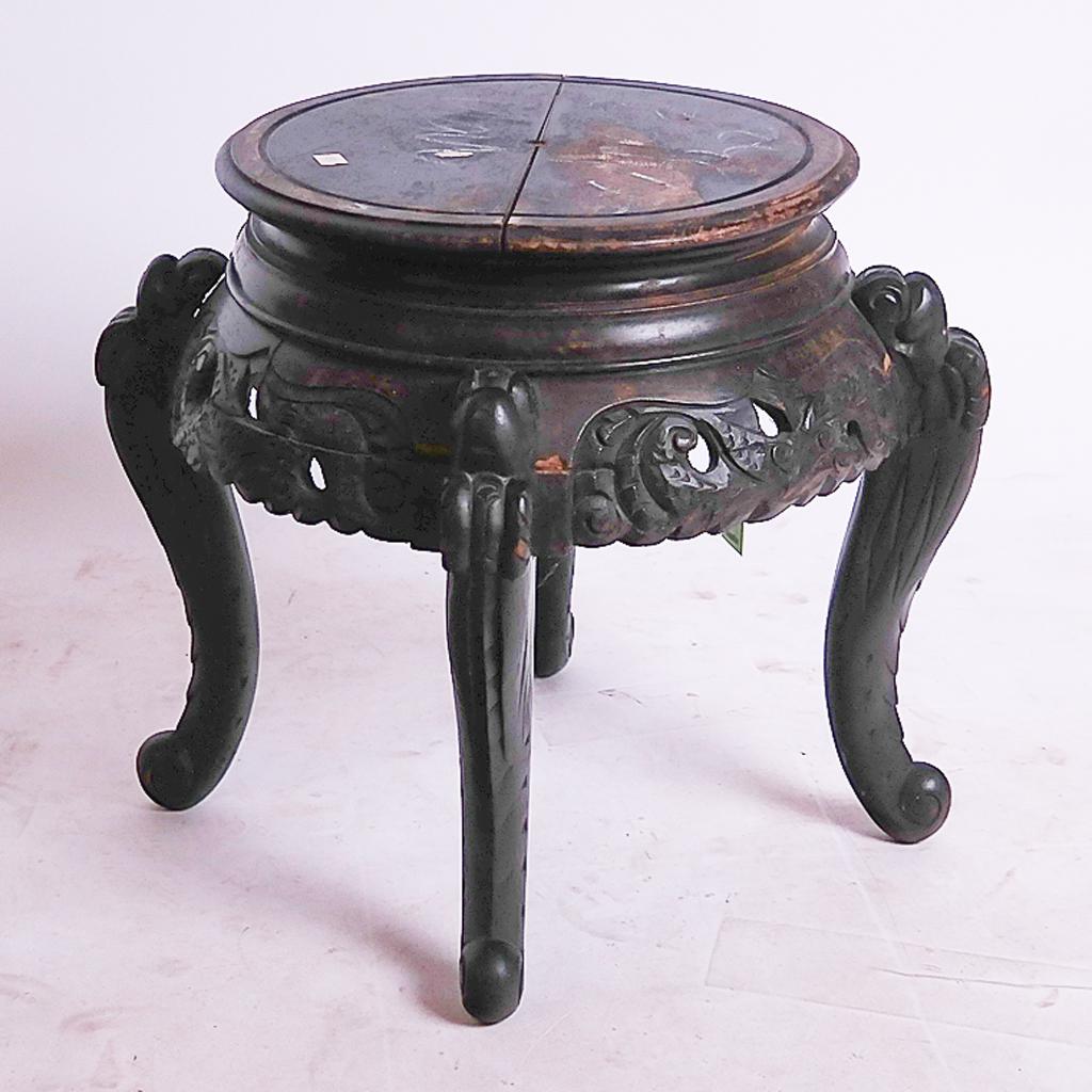 Ebonized Tabouret: Four-legged ebonized tabouret with pierced frieze. [18" H x 22" Diam.]. Chip to center of one foot; age cracks to top, otherwise in good condition.