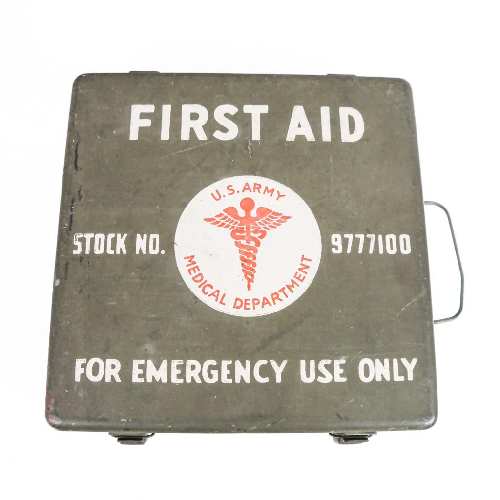 WW II First Aid Kit by Elizabeth Arden: Vintage WW II first aid kit "24 Unit Kit," not all original contents. Label inside designed by Elizabeth Arden for the U.S. Army. In good vintage condition.