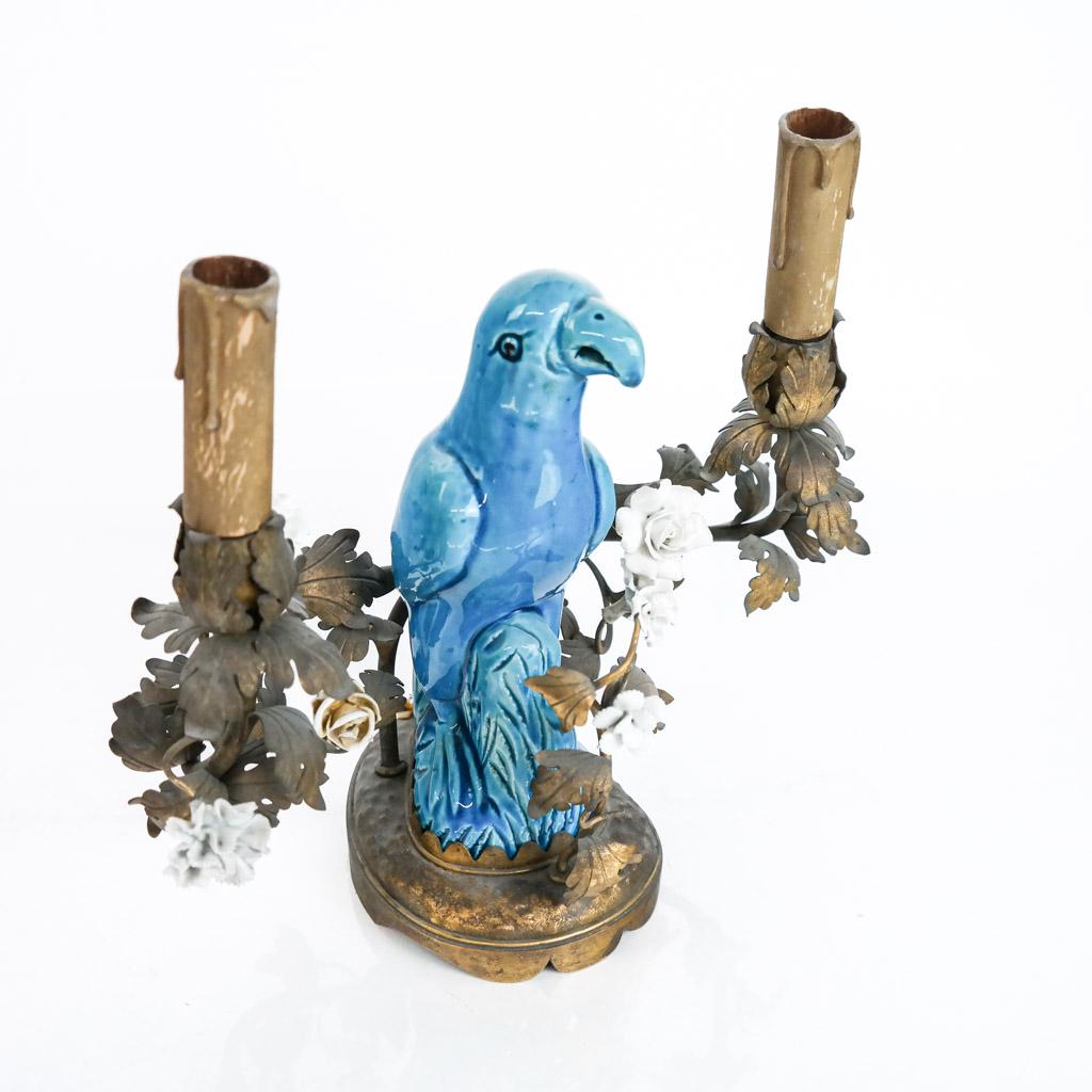 Chinese Porcelain Parrot Candelabra: Chinese gilt metal parrot with blanc de chine flowers decoration, mounted as a candelabra, late 19th / 20th century. [9 1/2" H x 11" W x 6" D]. In vintage condition.