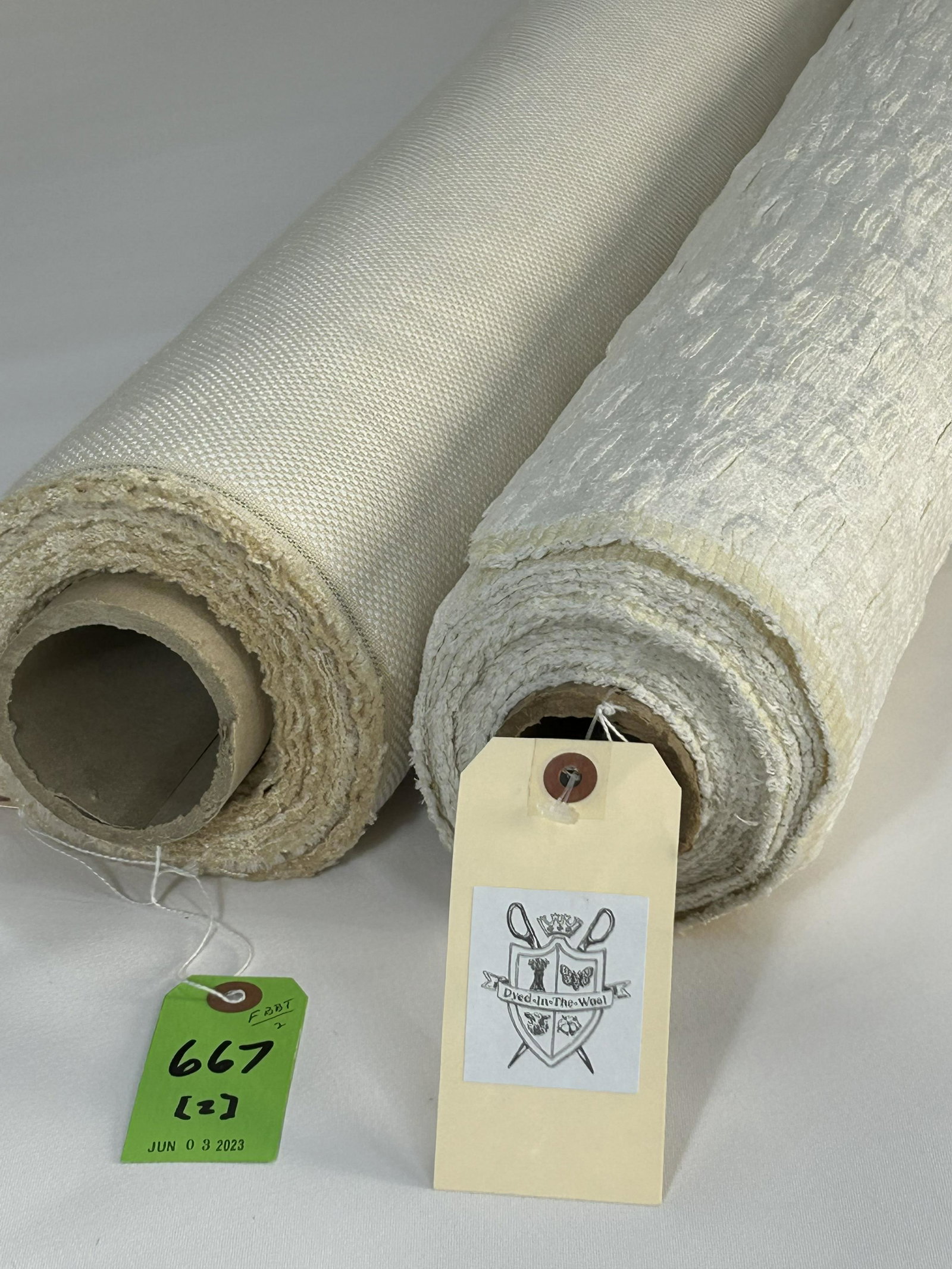 Claremont and Kravet Ivory Home Fabrics: 1) 11 3/4 yards of Claremont Furnishing Fabrics of London all-purpose home textile named "Toile Chenonleau" in "Creme", 53" wide. A cotton-linen blend. 2) 4 1/2 yards of Kravet's ivory lux chenille ca
