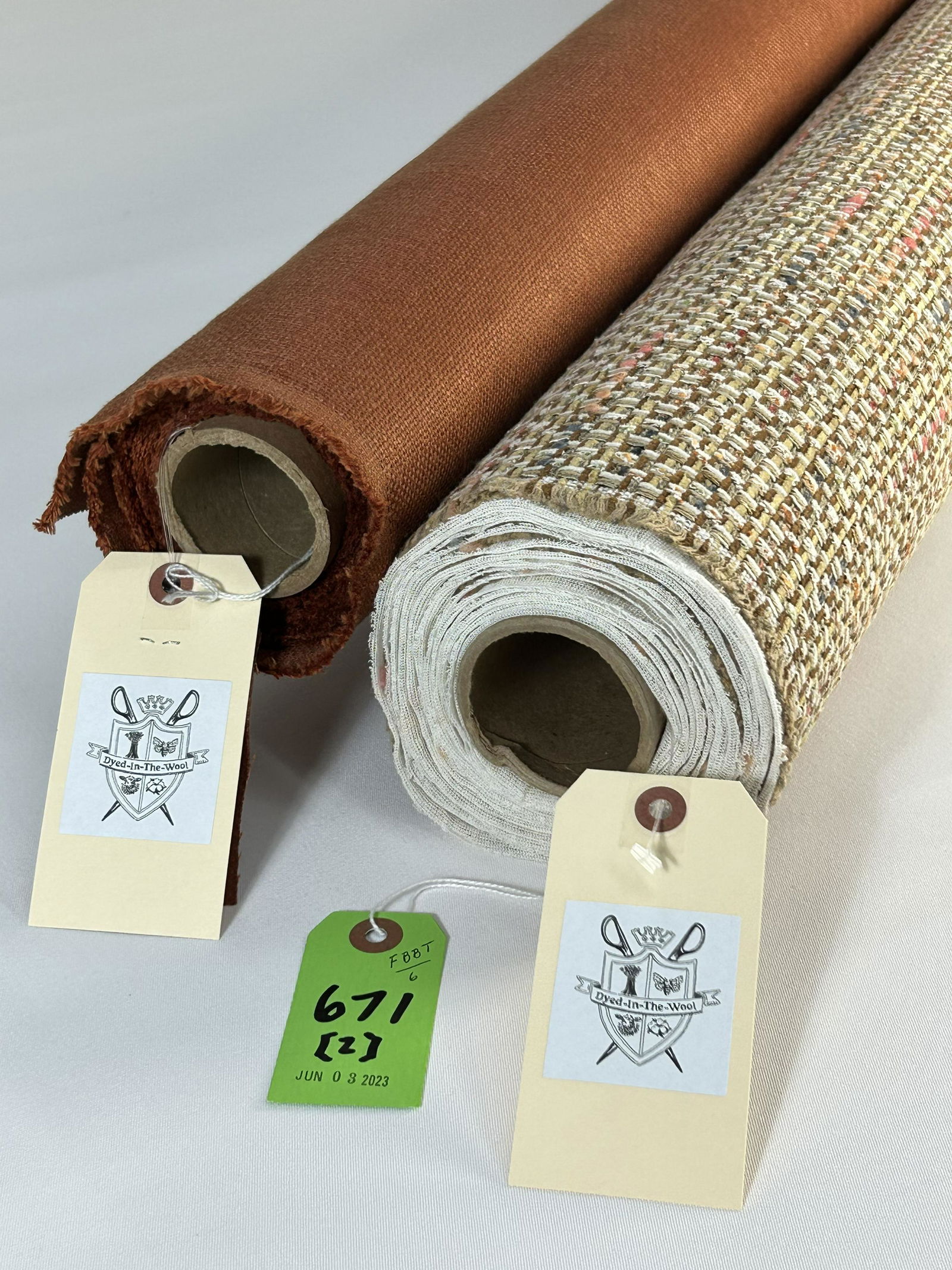 Hinson and Holly Hunt Home Fabrics: 1) 4 1/2 yards of Hinson's "Confetti" chenille upholstery texture in "Tan", #HN004.42007, 56 1/2" wide. Premium stain repel and knit backed. 2) 7 3/4 yards of Holly Hunt's "Back to Basics", 70% linen