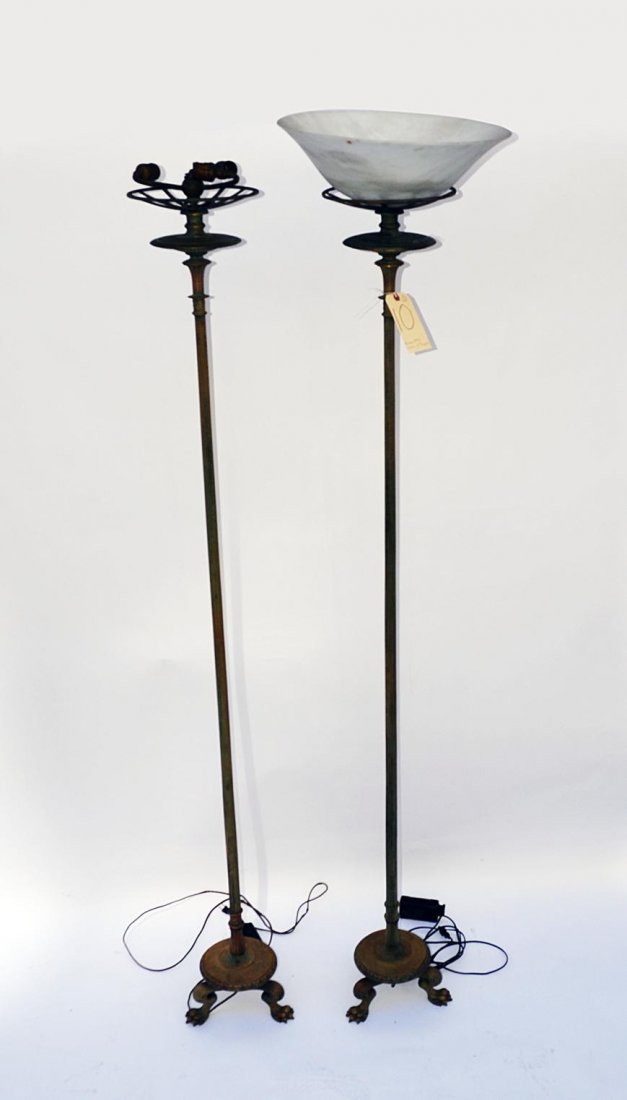 Pair of Bronze 19th C. Charles X Torchieres: Each feature fluted columns with lotus capitals and tripod bases with claw feet, one missing alabaster shade. 80 1/2" H x 11" Dia at base.