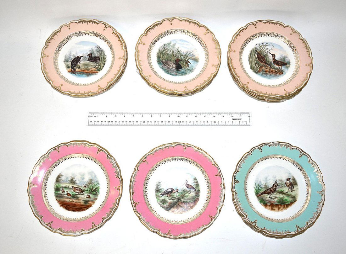 Sixteen KPM Plates, Germany: Four pink scenic plates, four pale blue scenic plates, together with eight tan scenic plates (all with ducks-birds-chickens) marked with the KPM scepter. Overall good. 9 1/2" Dia.