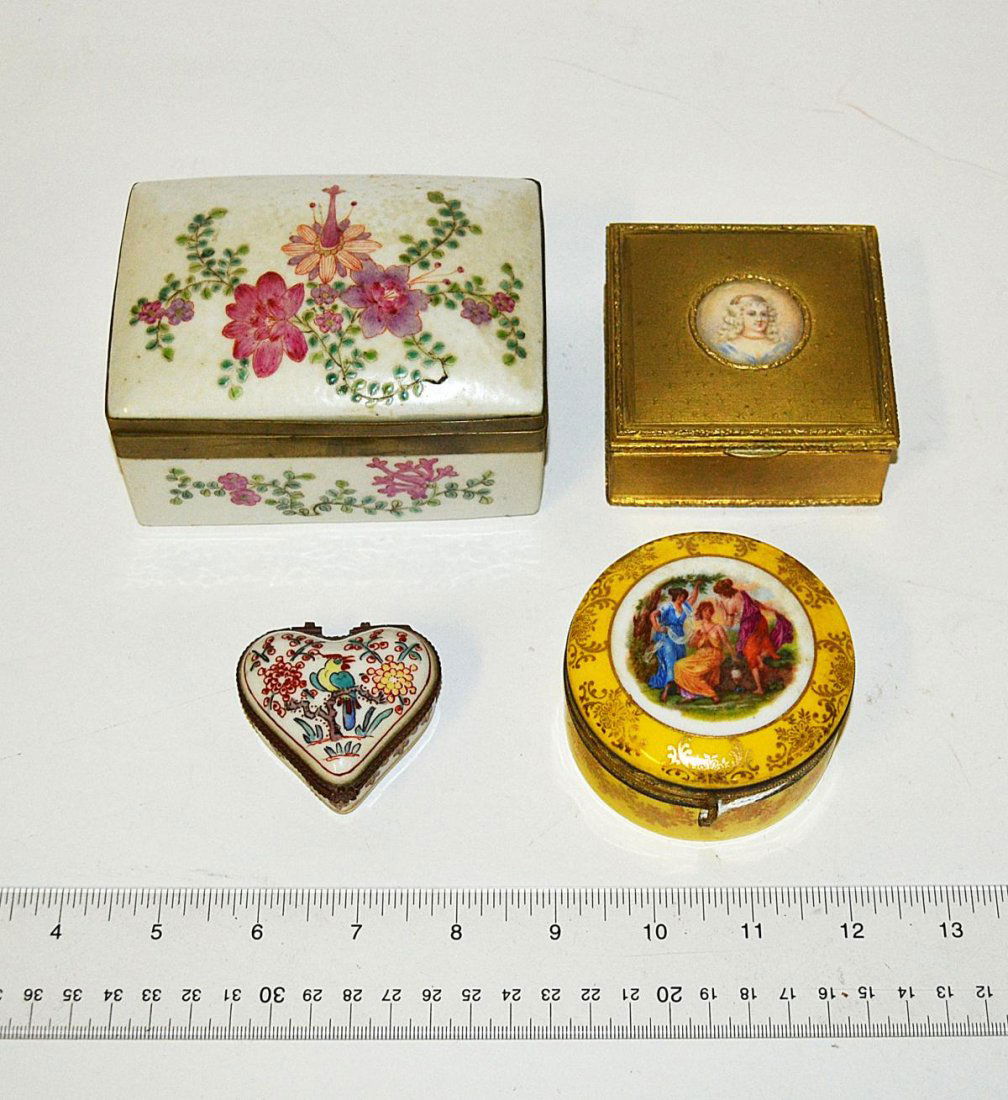 Four Decorative Boxes: Comprises: a Limoges porcelain heart-shaped box with rooster lid (1" H), a cylindrical German porcelain box with "Three Graces," (1 3/4"), a Chinese box with floral decor and bronze fittings (2 1/2" H