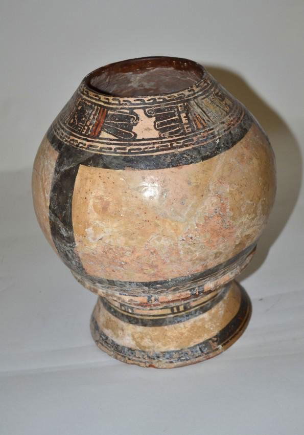 Pre-Columbian Central American Vessel: Pre-Columbian (attributed) earthenware vessel on wide footed base. Top features a wide painted band with geometric design. Bears multiple repairs, pitting and chips, otherwise complete. Accompanied by