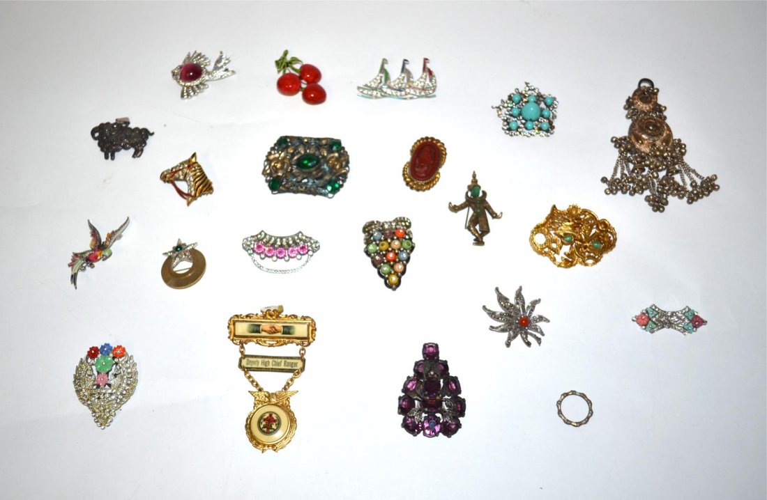 Assorted Costume Jewelry Pins: Comprises mostly colored glass and paste stones. Includes cinnabar, enamel, coral, and jade. 20 items total.