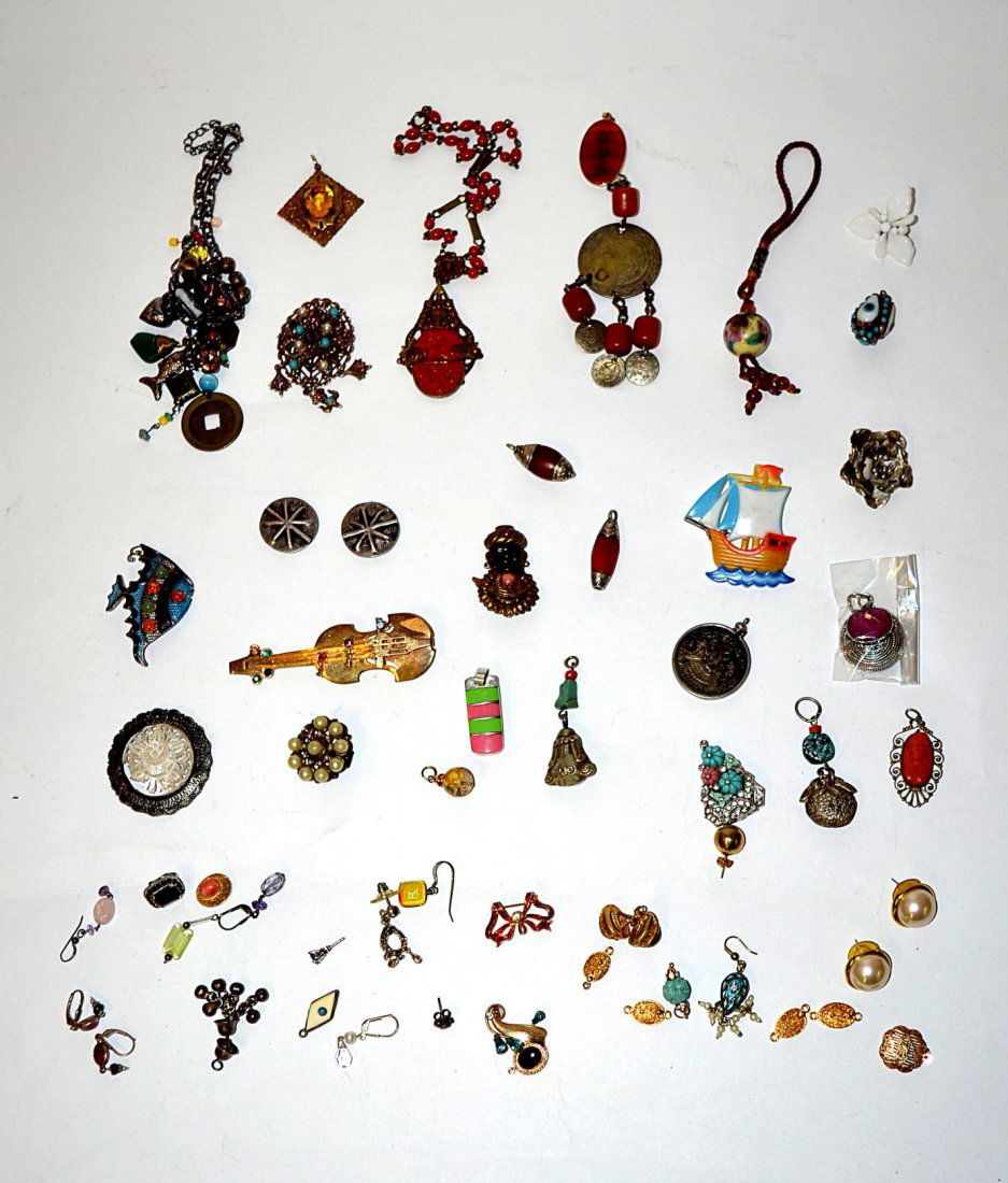 Assorted Costume Jewelry (40 + Articles): Includes pendants, earrings, pins, and Asian charm bracelet, among others. Includes some .925 silver pieces. Features enamel, colored paste stones, pearls, turquoise, and coral.