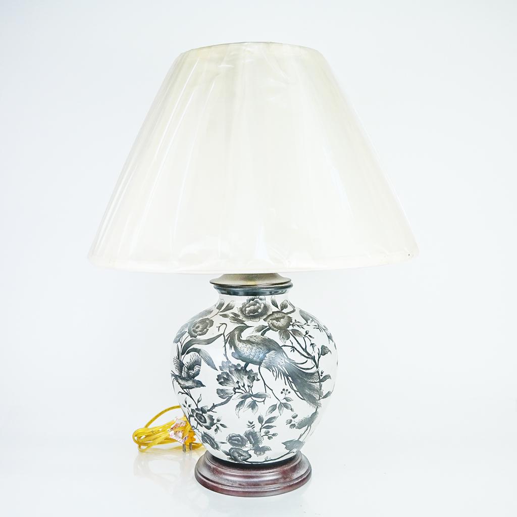Chinese Black & White Porcelain Lamp: Chinese black and white porcelain lamp, decorated with birds and flowering branches. [Overall: 25" H x 18 1/2" Diam.]. Minor residue and wear.