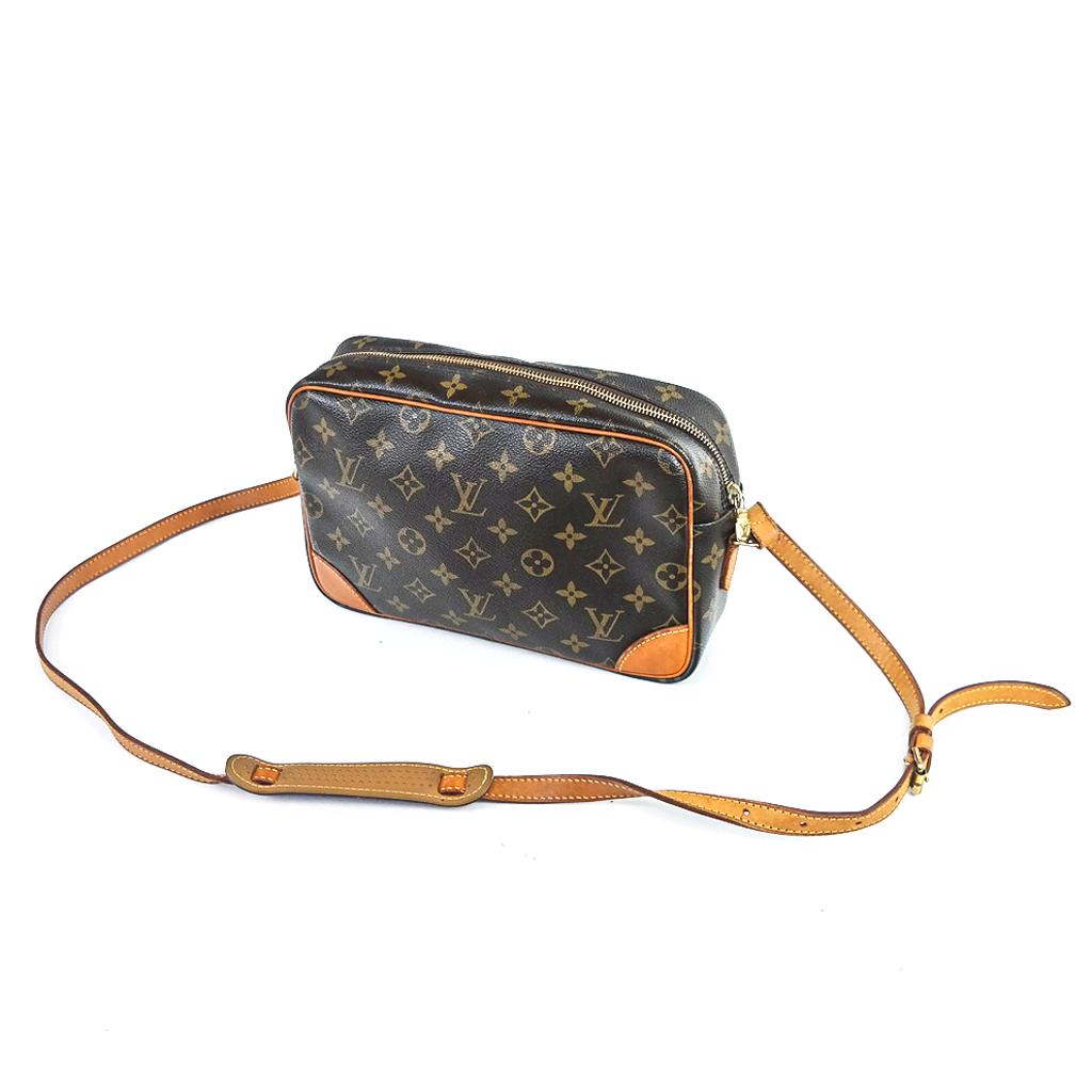 Vintage Louis Vuitton Trocadero 27 Handbag: Vintage Louis Vuitton Trocadero 27 handbag, circa 2005, in monogram canvas with vachetta leather trim, logo stamped interior and bearing date code MB0015 for January 2005. [7" H x 10 1/2" W x 2 3/4" D