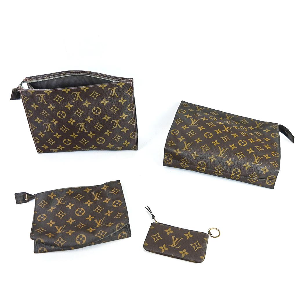 Vintage Louis Vuitton Group of 4 Small Pouches: Group of 4 small vintage Louis Vuitton pochettes and a coin pouch, circa 1980s, one retailed by Saks Fifth Avenue, one with Tyvek label for the French company. [Largest: 7 3/4" H x 9 3/4" W x 2 1/4" D