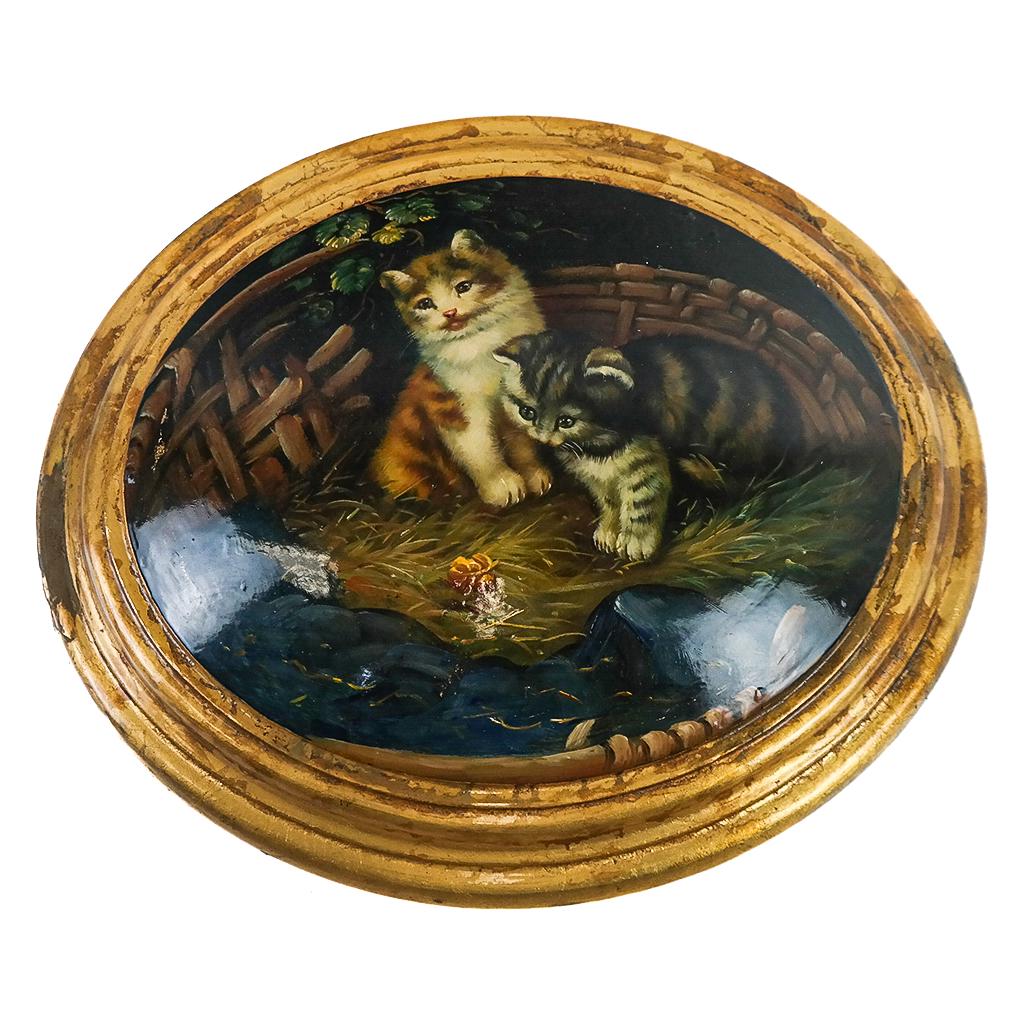 Decorative Painting of Cats in a Basket: Oval cutling with gilt border. Unsigned. [11 x 13 1/2 x 2 inches]. Restoration and inpainting.
