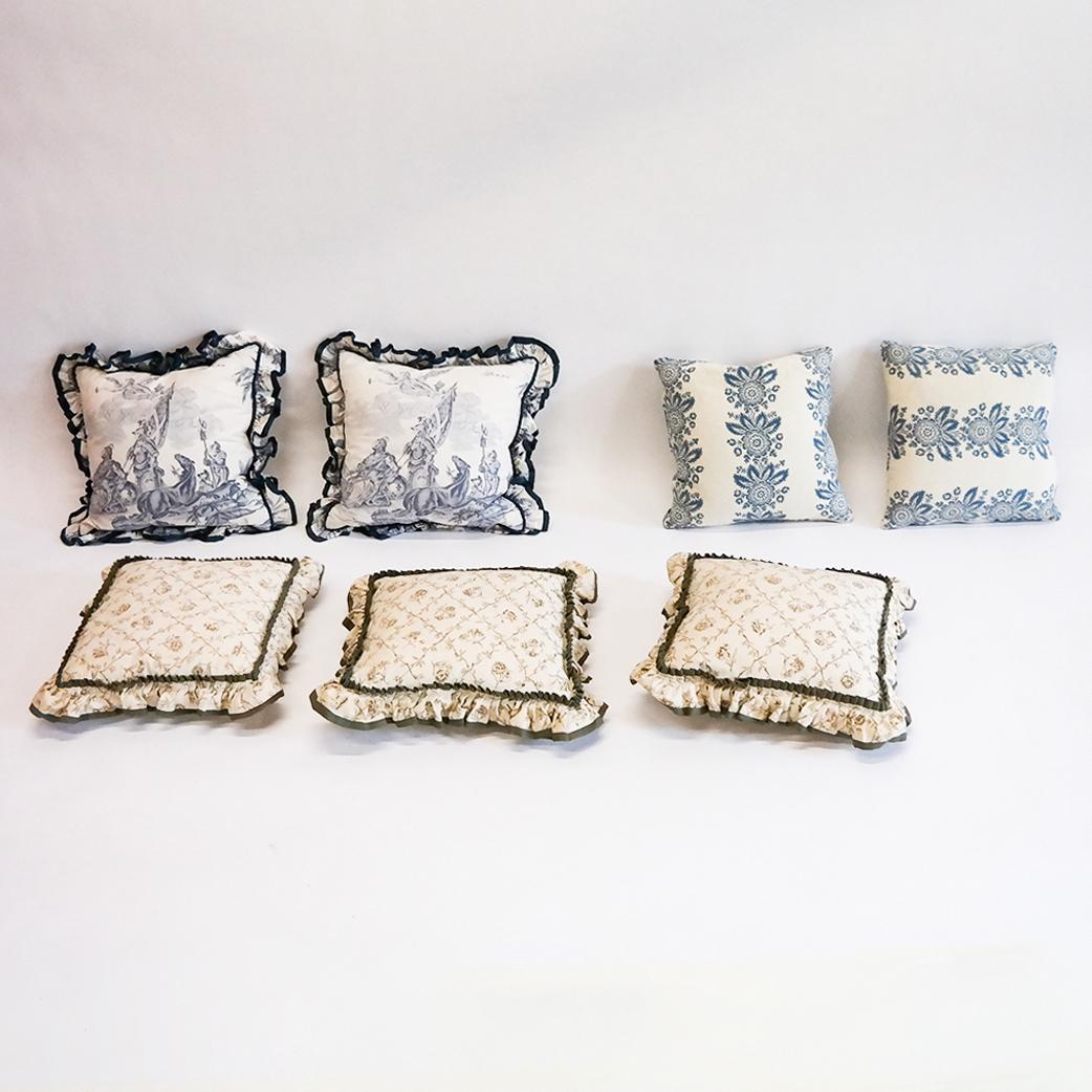 Assembled Group of Cushions & Throw Pillows: Assembled group of cushions and throw pillows, with toile and other design fabrics. [Largest: 16" x 16"]. Light marks and wear.