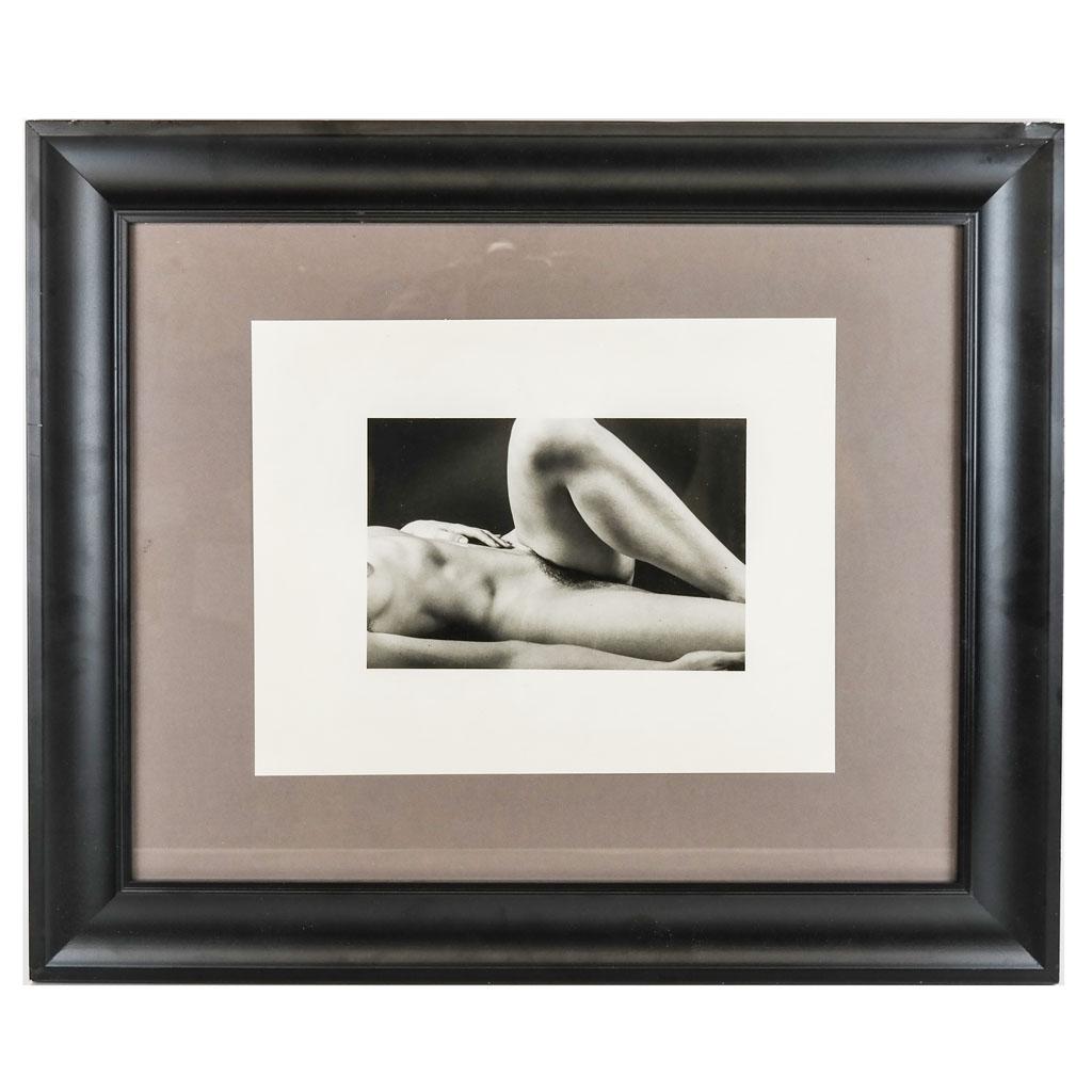 Reclining Nude - Black & White Photograph: Black and white photograph of a reclining nude, artist unknown, inscribed verso. [Frame: 20 1/2" H x 24 1/2" W]. Losses to frame.