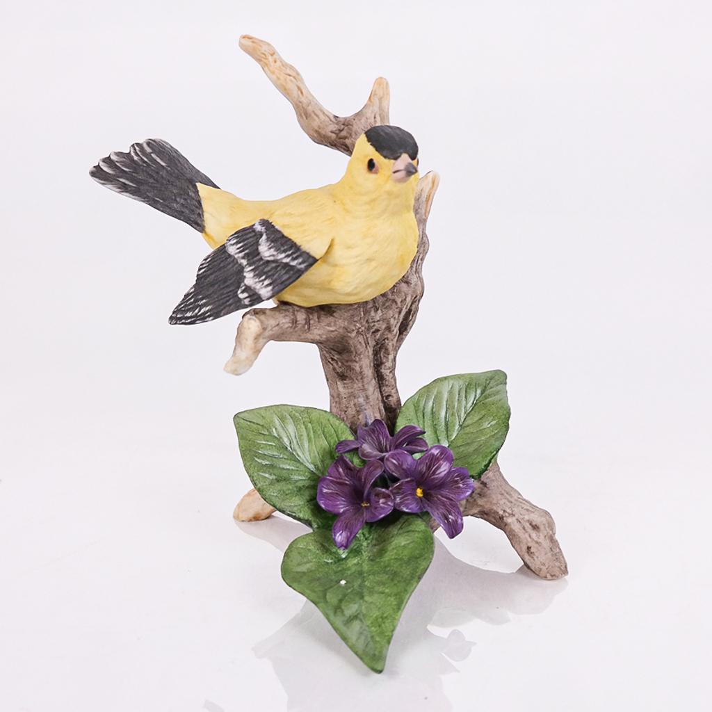 Boehm Model of a Goldfinch, 1988: Boehm model of a Goldfinch, copyright 1988, in colored bisque porcelain, bearing firm's mark to underside, numbered 400-38. [6" H x 6" W x 5" D]. In good condition.