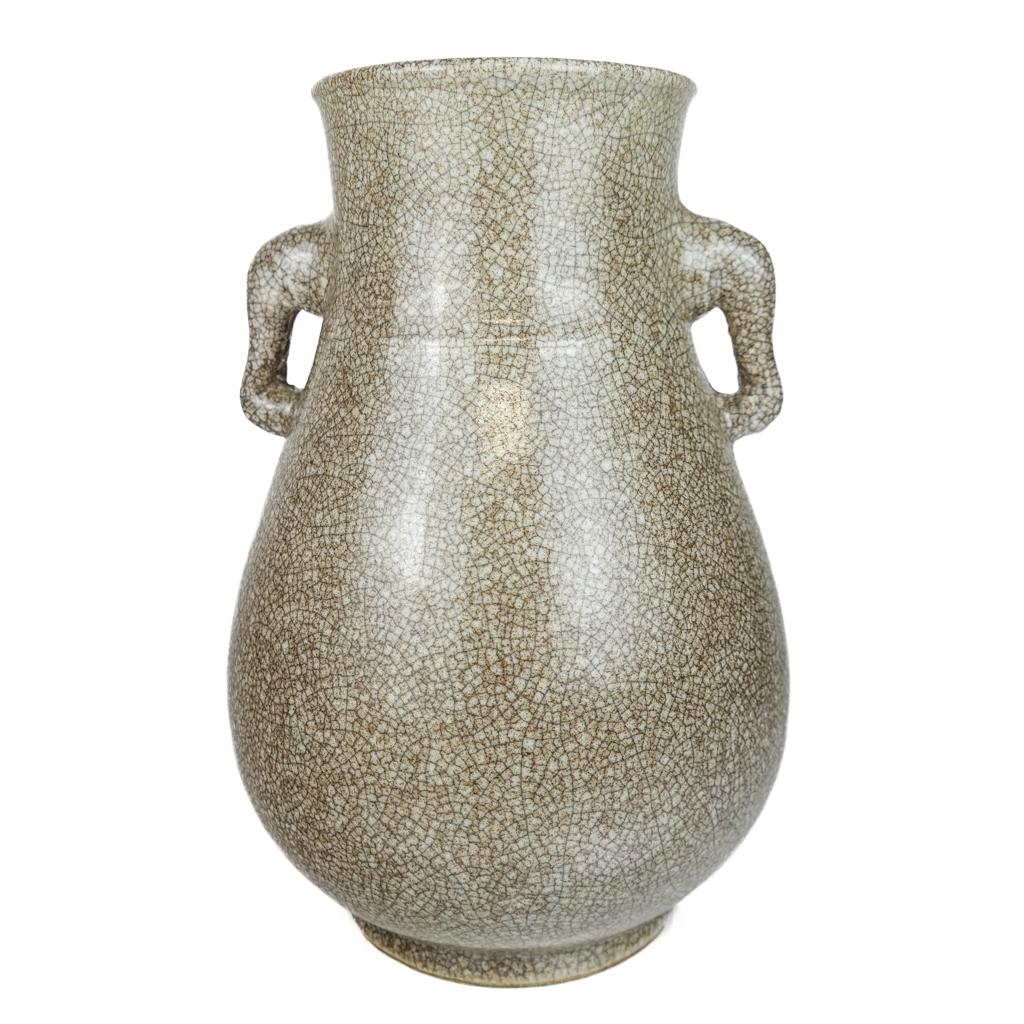 Antique Chinese Porcelain Vase: Crackle glazed porcelain vase, light brown in color with elephant-form handles. 18th century. [12 1/2 H x 7 1/2 D inches]. In good condition.