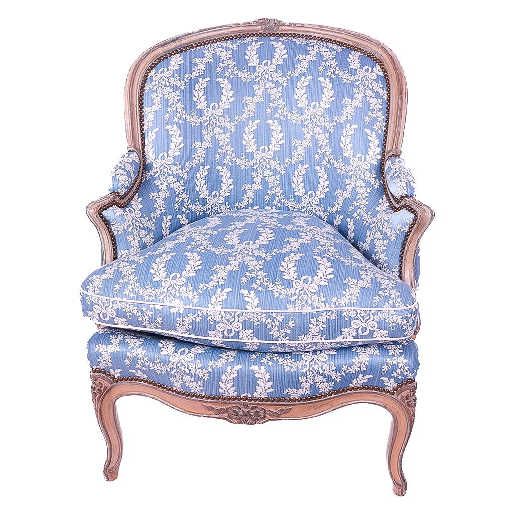 Louis XV-Style Painted Bergere: Ivory and blue-grey painted bergere with blue floral upholstery. 20th century. [38 x 25 x 31 inches].