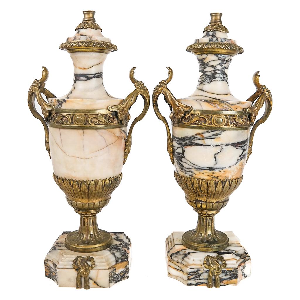 Pair Bronze and Marble Cassolette Dishes: Top quality variegated marble, tiered and stepped base, with applied ribbon detail. Berry decoration. [15 x 7 x 4 1/4 inches]. Lacking top finials, otherwise in good condition.