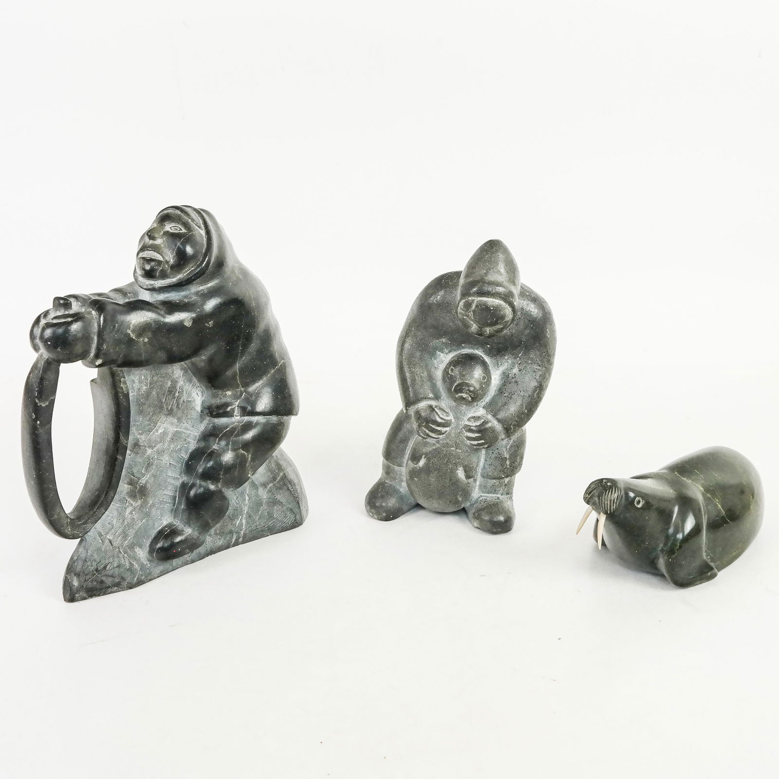 Three Inuit-Style Carved Stone Figures (1 of 9)