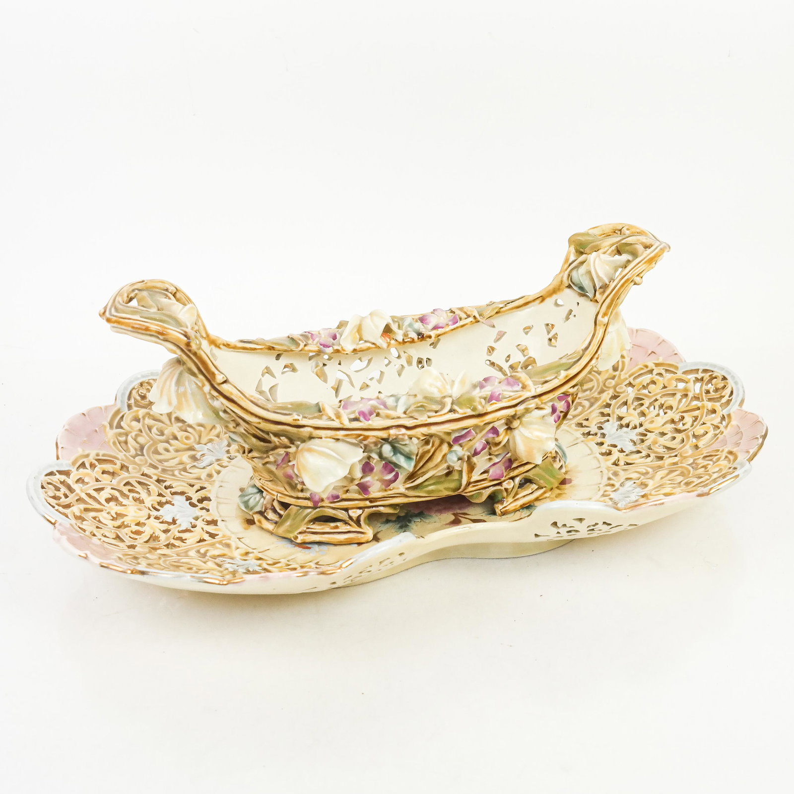 Austro-Hungarian 2-Piece Centerpiece: Austro-Hungarian 2-part centerpiece, comprising an oblong glazed openwork bowl on a matching underplate tray. [Overall: 7" H x 19" W x 12" D].