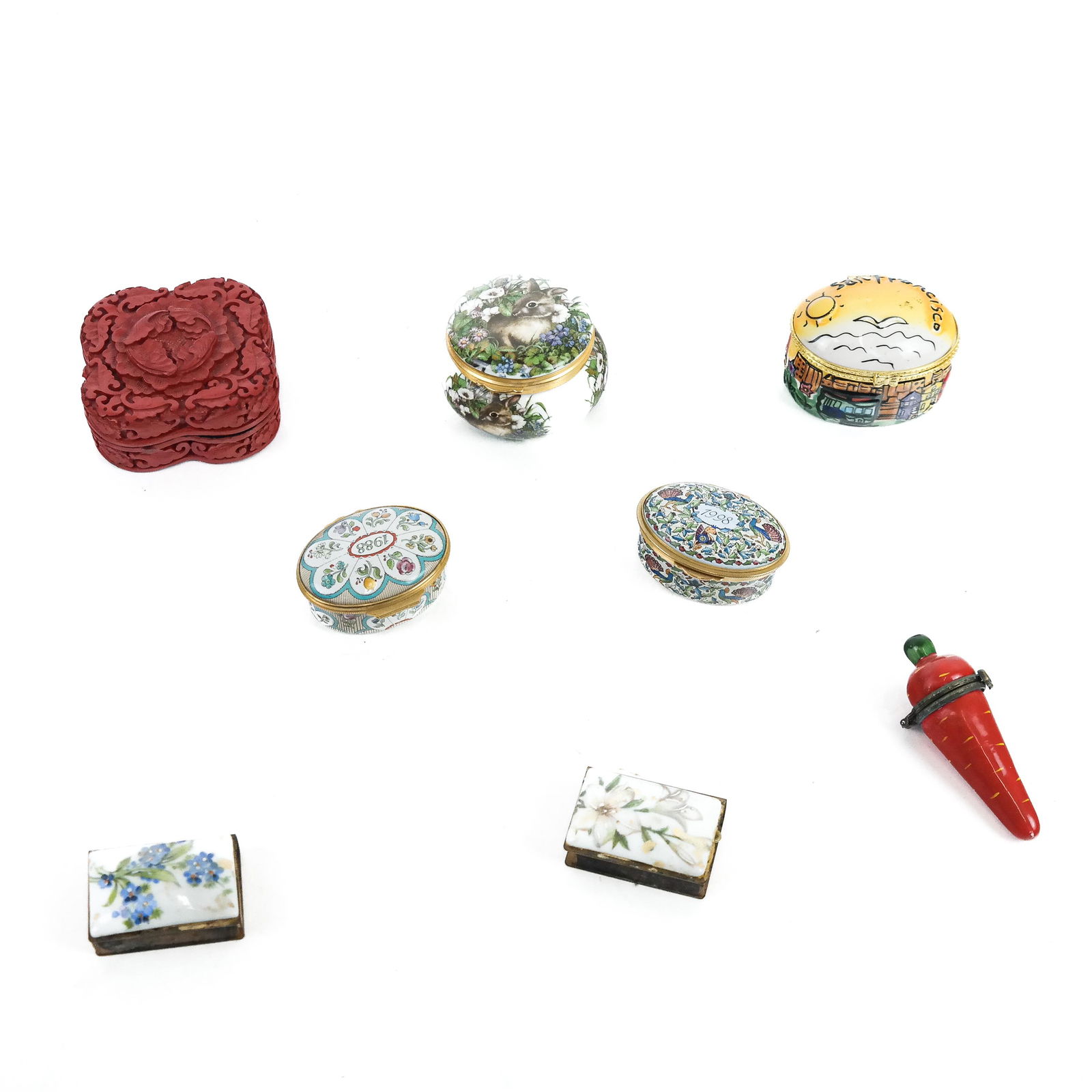 Eight Small Decorative Boxes and Glass Items: Group consisting of: an Avondale bone china box with rabbits; two Staffordshire enamel commemorative boxes (1988 and 1998); two porcelain mounted matchboxes; a San Francisco box; a cinnabar-style box,