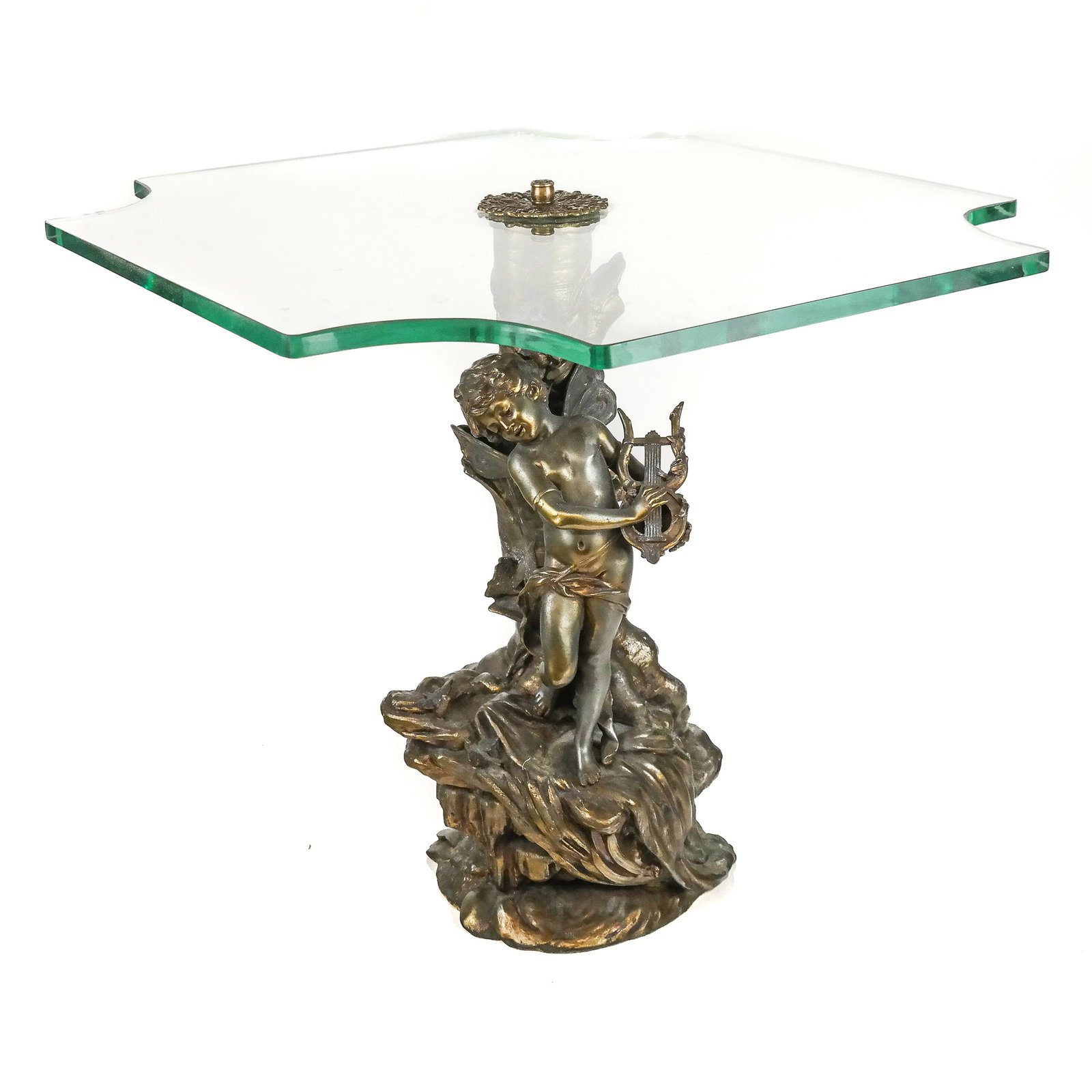 Bronze Based Table With Glass Top: Fully modeled base int he round with tree stump, floral and fauna, Cupid/Psyche motifs. Pierced for electricity. Signed indistinctly. 20th century. [20 x 22 x 26 inches]. Uneven patina.