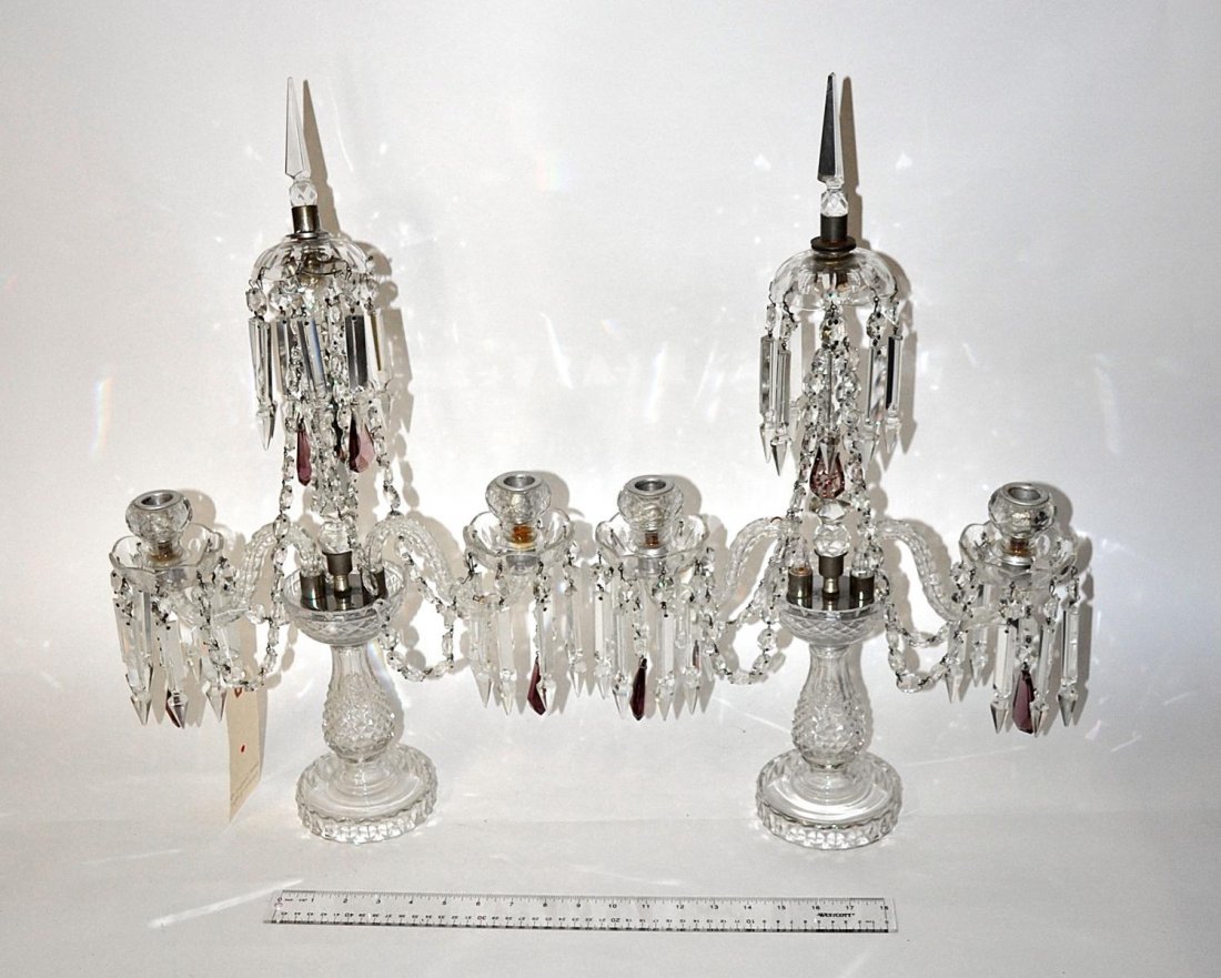 Pair of Crystal Girandoles: Each have two arms and spear form finials. Finials bear minor chips, overall in good condition. 23 1/2" x 14".