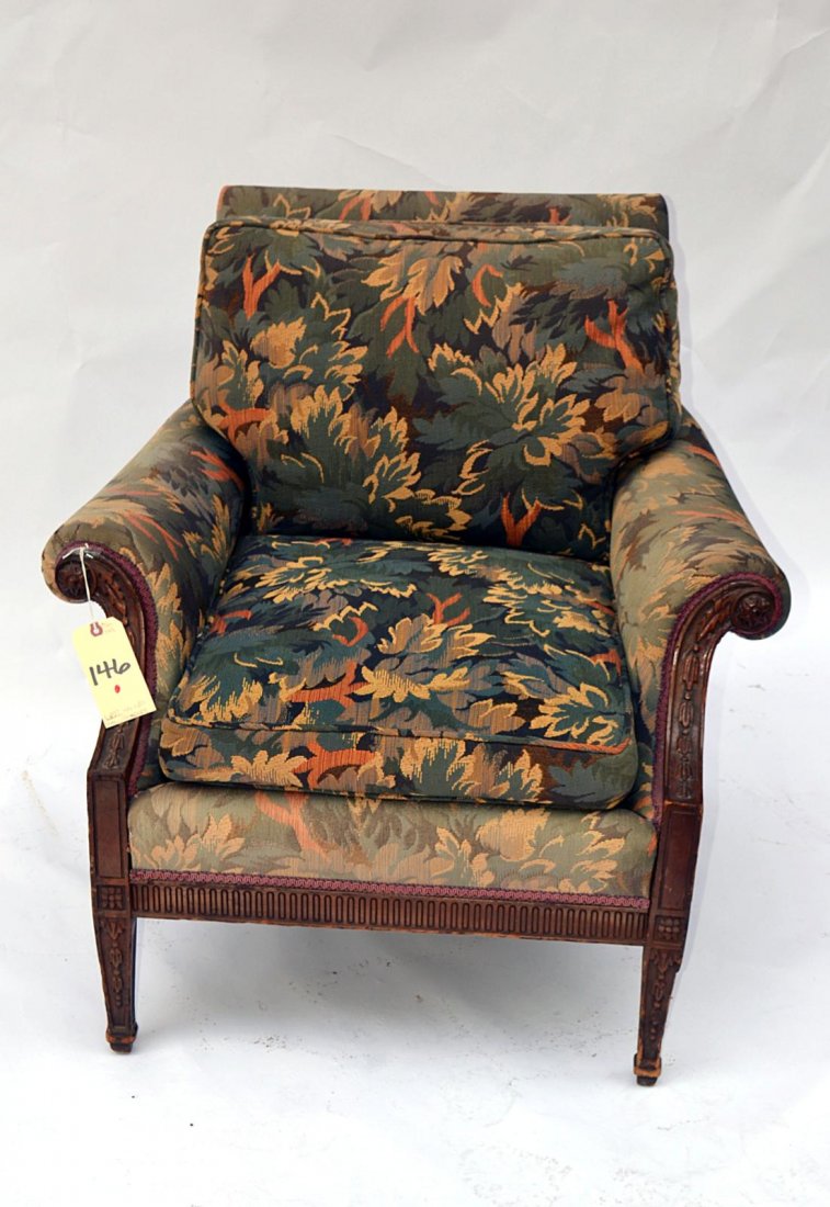 Louis XVI-Style Carved Walnut Bergère: A Louis XVI-style carved walnut upholstered bergère having a goose down cushion. French, 20th C. Good condition. From the Estate of Arthur Laurents.