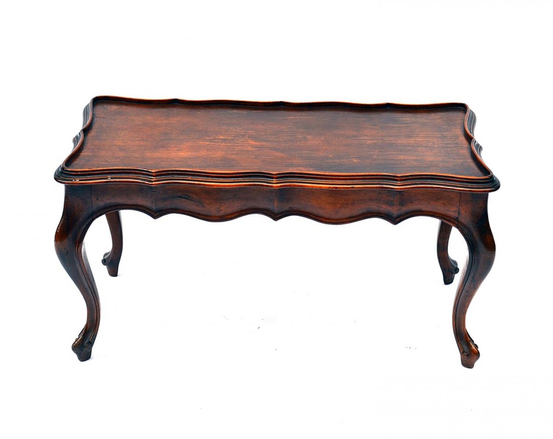 LXV Style Walnut Center Table: A Louis XV style walnut cocktail table with gallery. American, 20th C. Good condition. From the Estate of Arthur Laurents.
