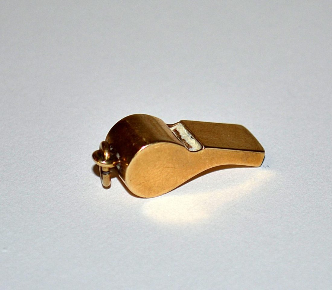14k Gold Mini Whistle: A Tiffany & Co. 14k yellow gold miniature whistle. American, 20th C. Good condition. From the Estate of Arthur Laurents.
