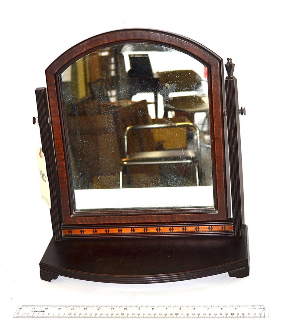 Inlaid Mahogany Shaving Mirror: An American 20th C. inlaid mahogany shaving mirror. Fair condition. From the Estate of Arthur Laurents.