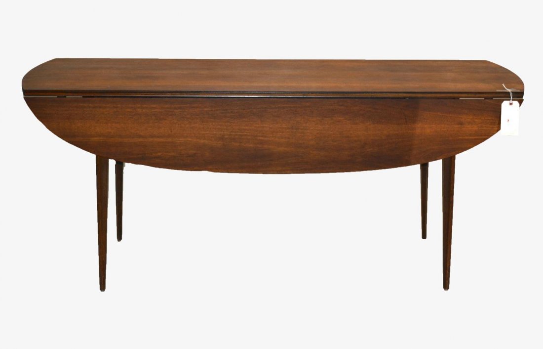 Mahogany Drop-Leaf Table: Oval-form table on shaped tapered legs. 30" H x 72" L x 48" [open], 20" [leaves down].