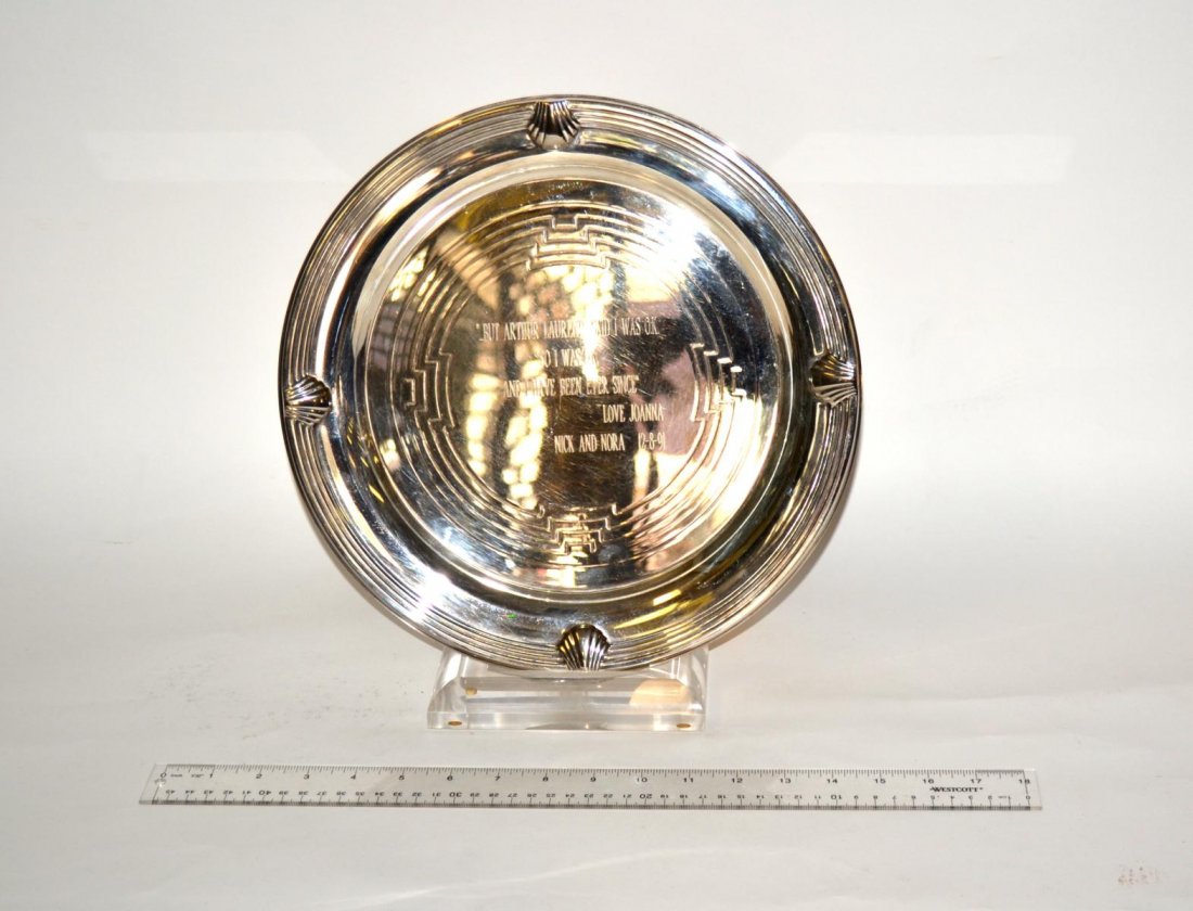 Joanna Gleason, Engraved Presentation Charger: Silver plate charger bearing engraved inscription: " 'But Arthur Laurents said I was o.k./ So I was o.k. / and I have been ever since' / Love Joanna / Nick and Nora 12-8-91". 12 3/4" Dia x 1" H. Some 