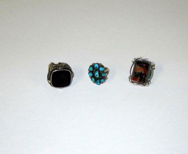 Three Sterling Silver Rings: An Antique intaglio turquoise cluster and a marble inset.
